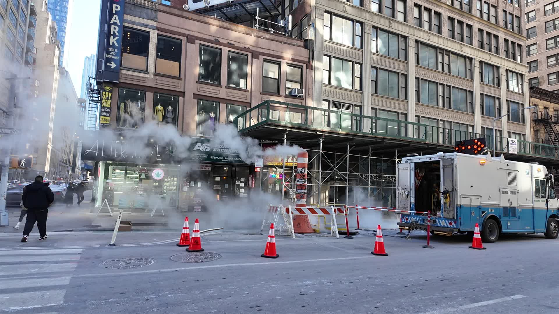 Underground steam flows from flume on Sixth Avenue