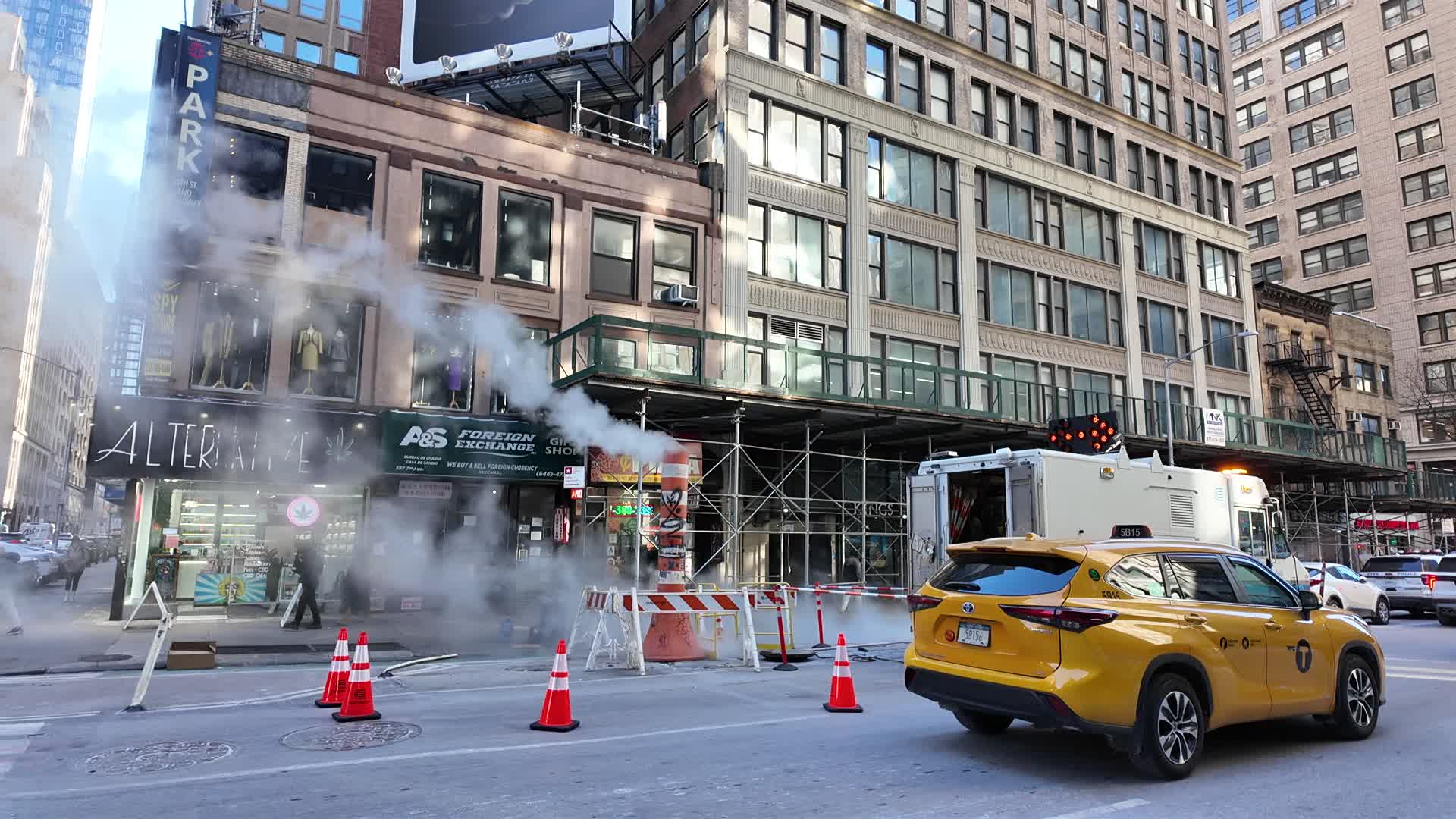 Underground steam flows from flume on Sixth Avenue