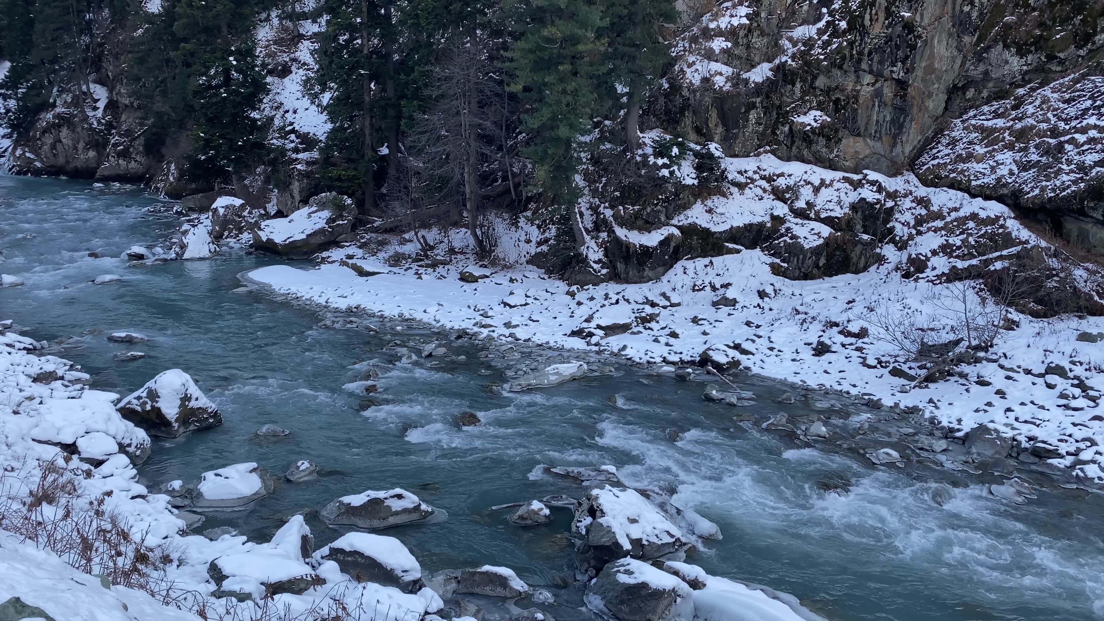A view of partially frozen river sindh during winter