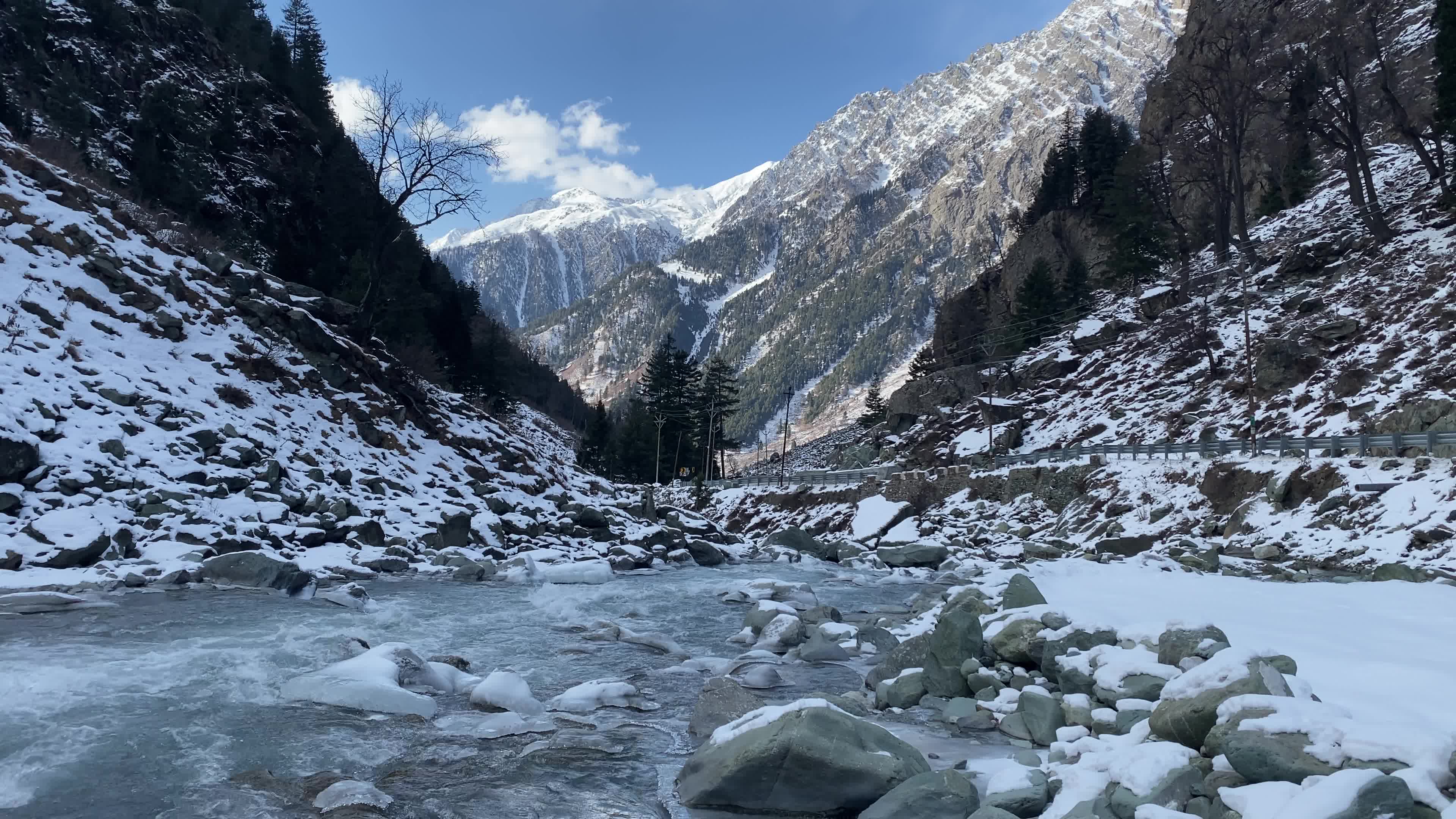 A view of partially frozen river sindh during winter.