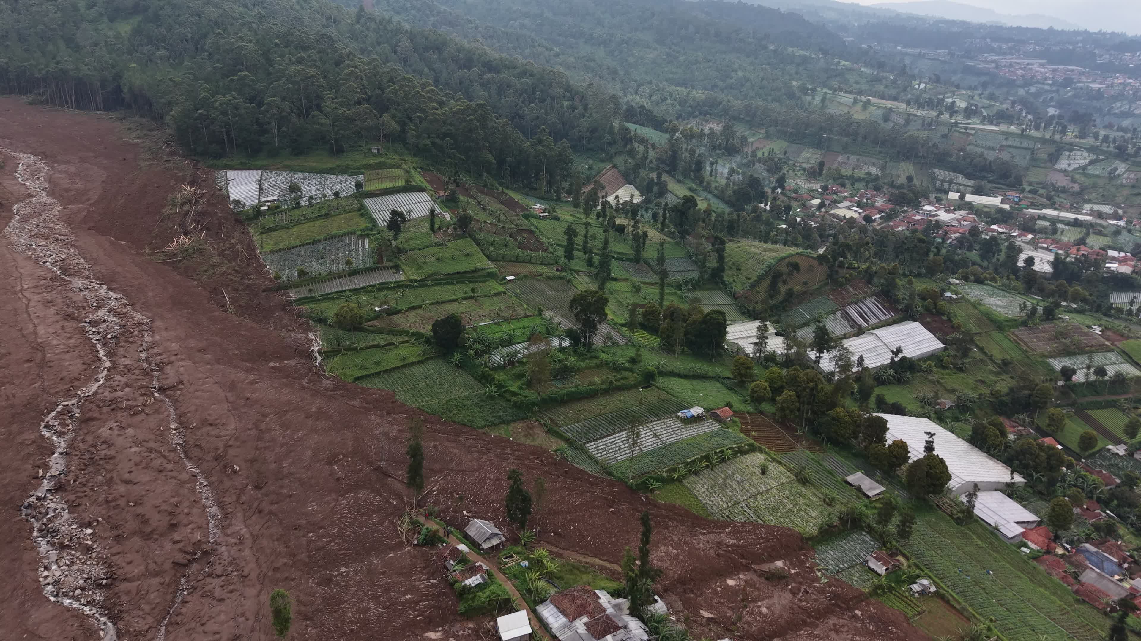 Indonesia landslide death toll rises to 17, dozens missing