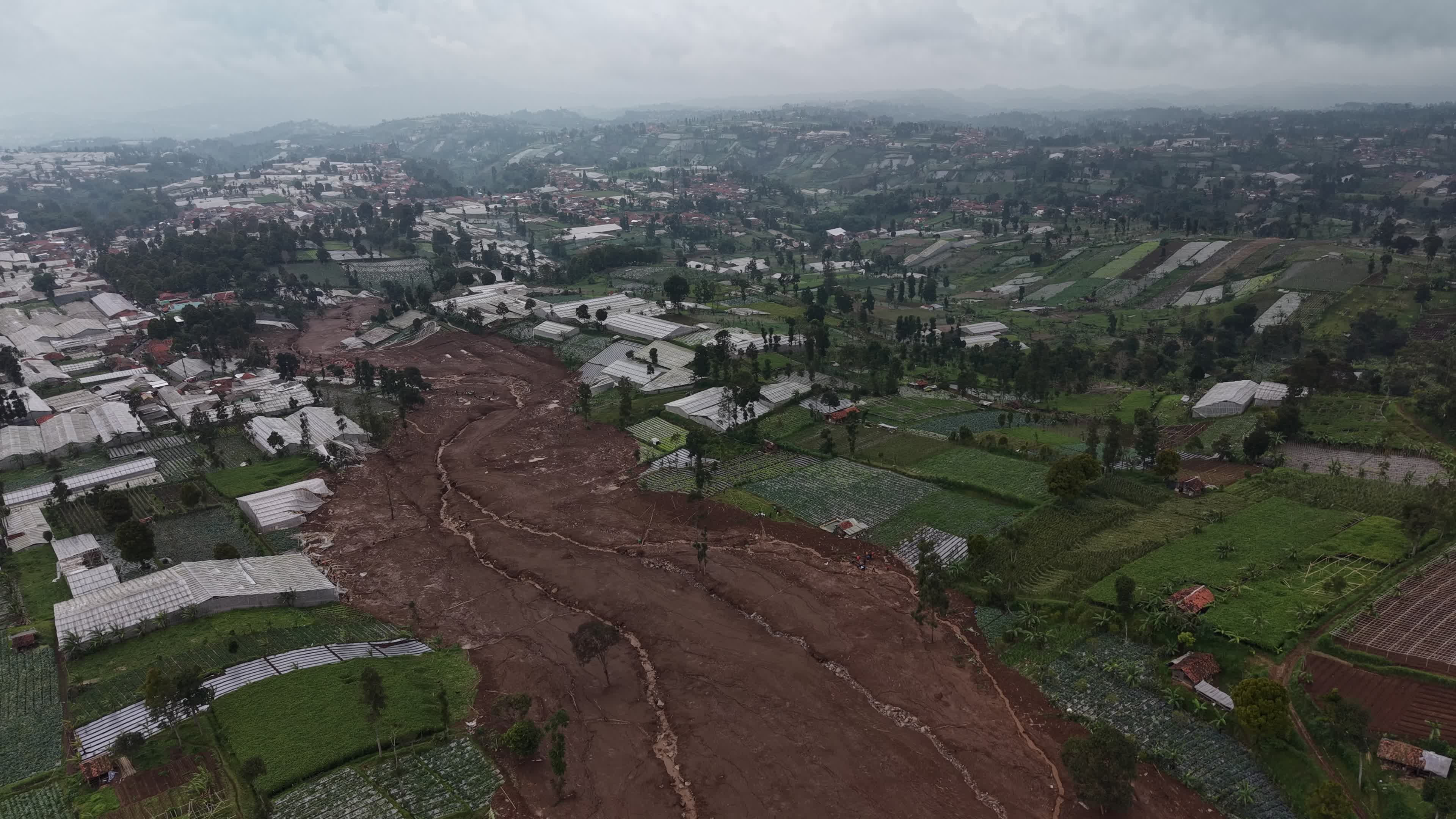 Indonesia landslide death toll rises to 17, dozens missing