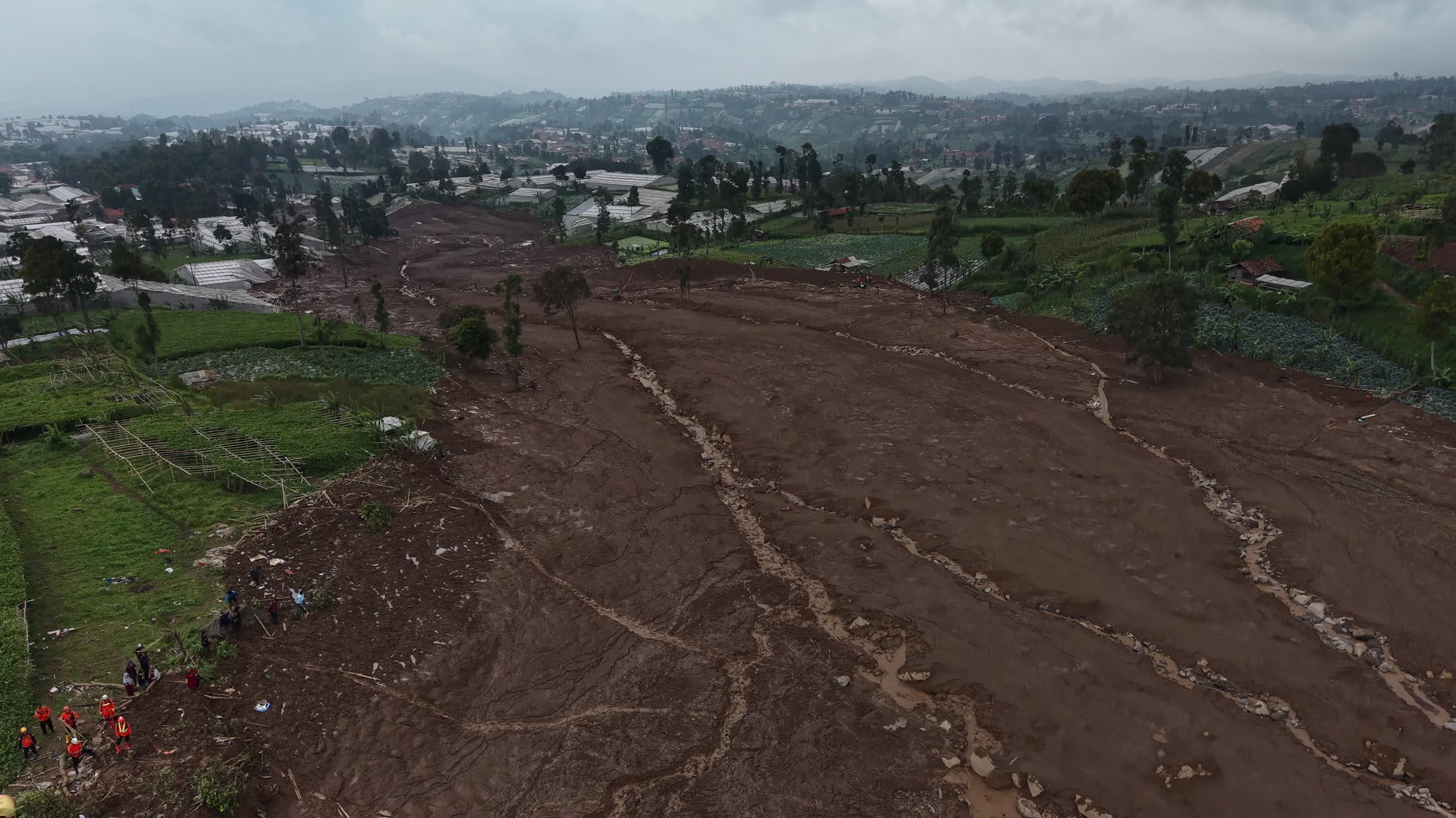 Indonesia landslide death toll rises to 17, dozens missing