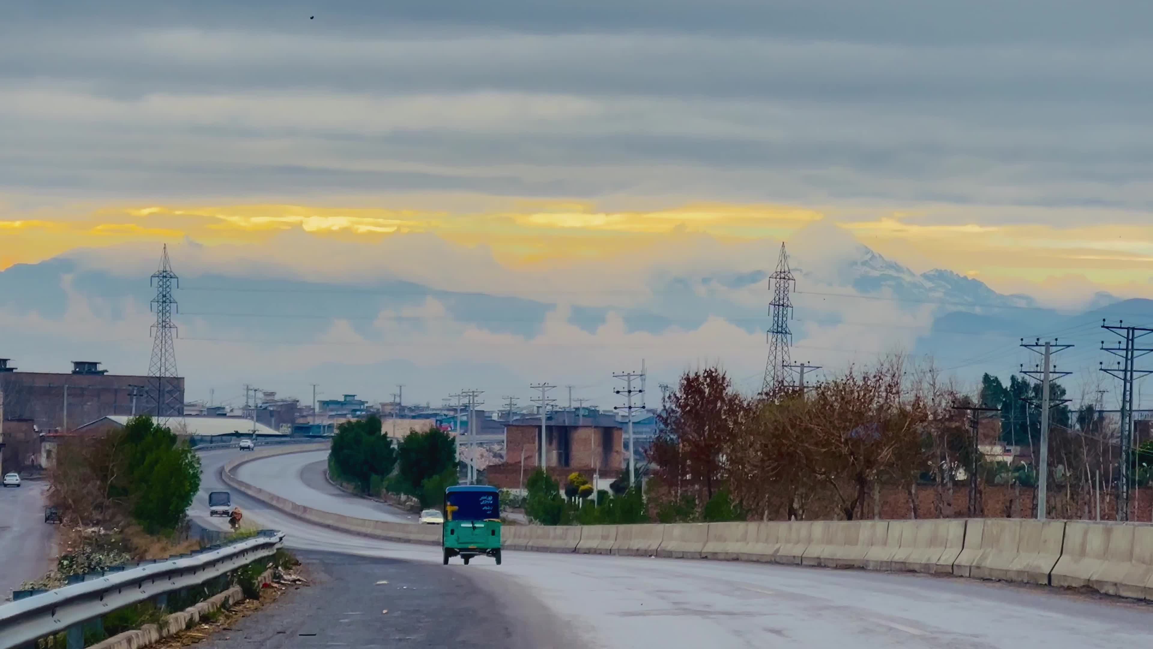 Snow-Covered Mountain Peaks Overlooking Peshawar 
