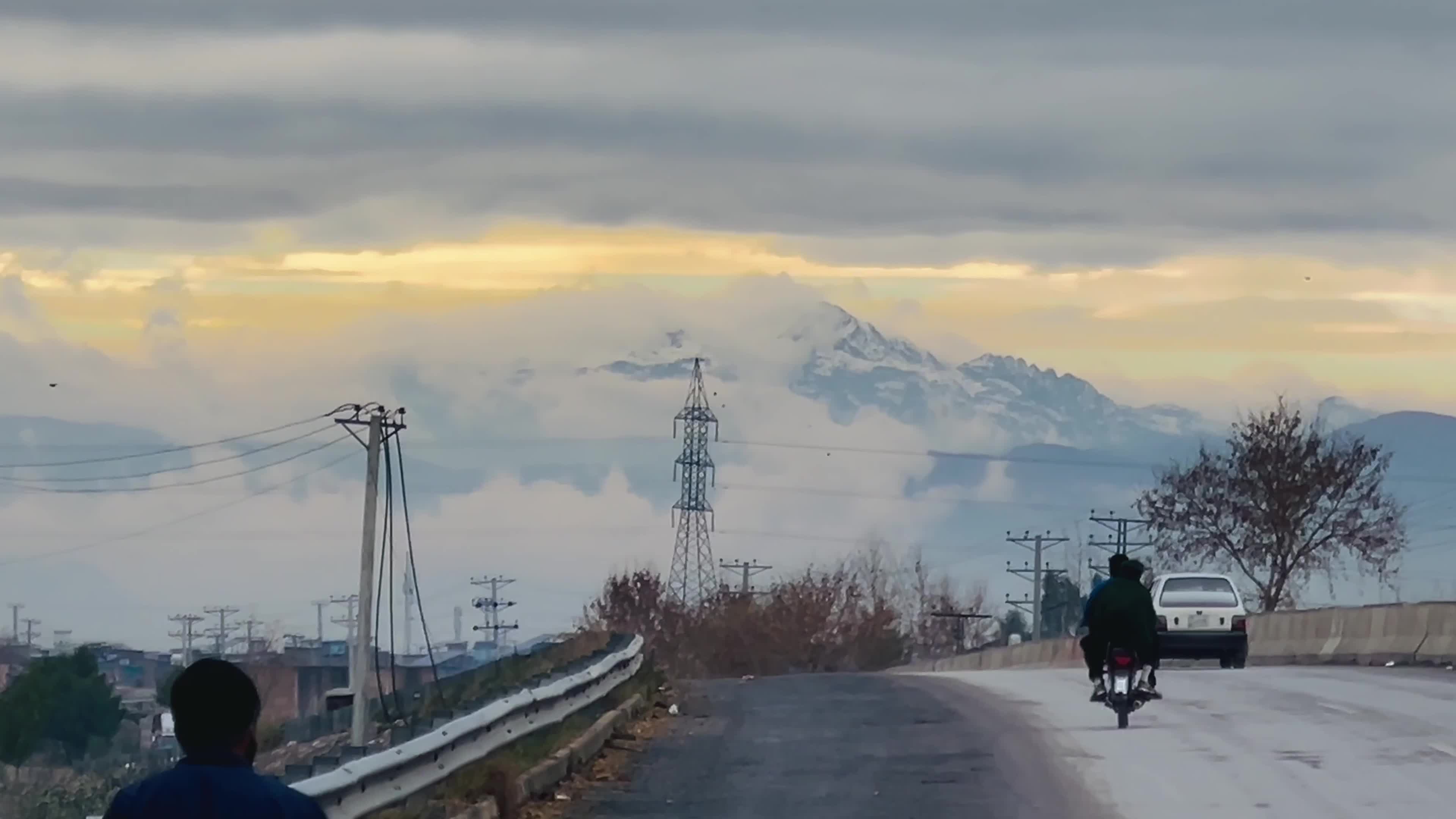 Snow-Covered Mountain Peaks Overlooking Peshawar 