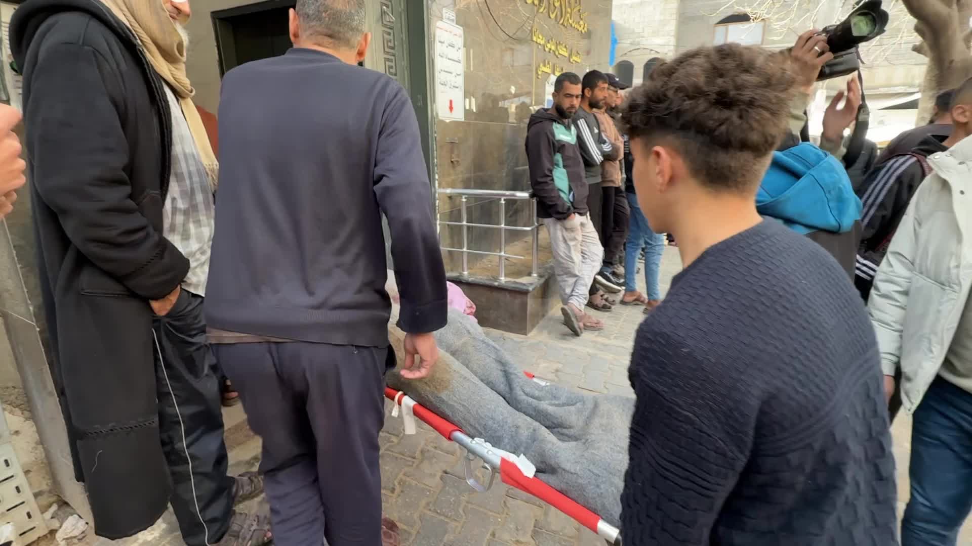 GRAPHIC CONTENT - Mourners React Following Israeli Strike At Al-Shifa Hospital In Gaza City