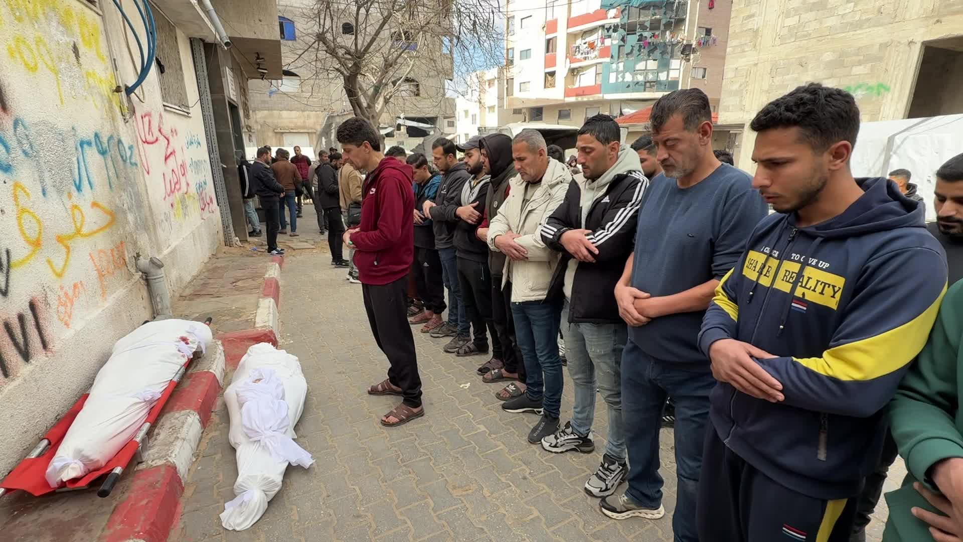 GRAPHIC CONTENT - Mourners React Following Israeli Strike At Al-Shifa Hospital In Gaza City