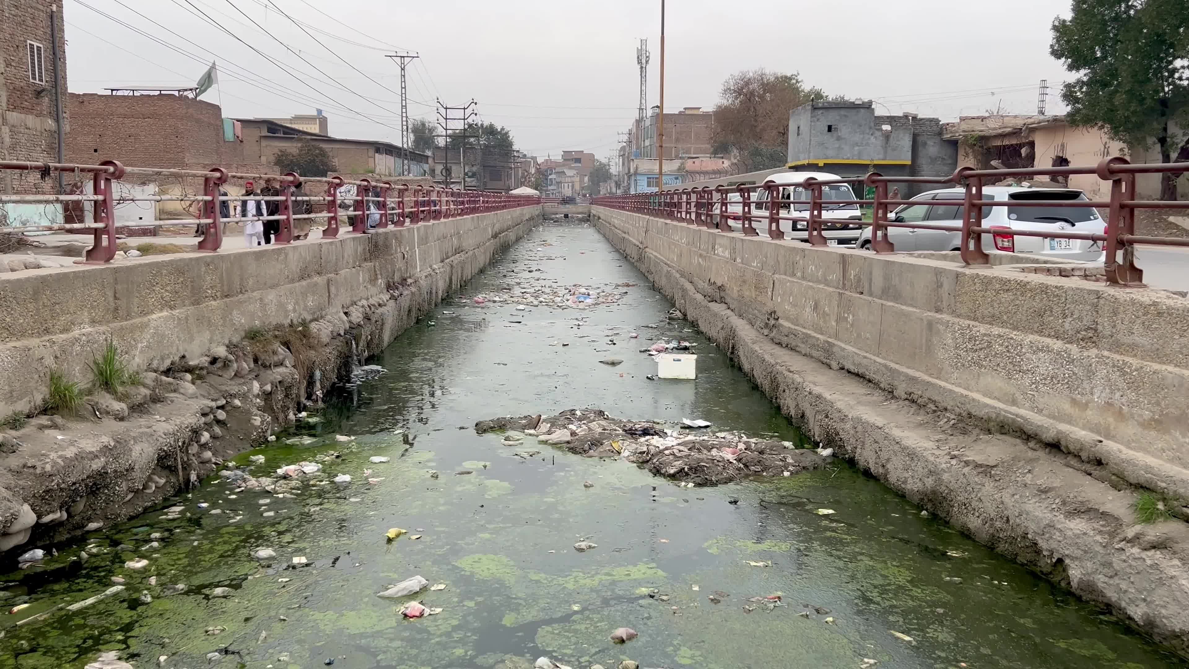 Garbage clogs canal in Peshawar 