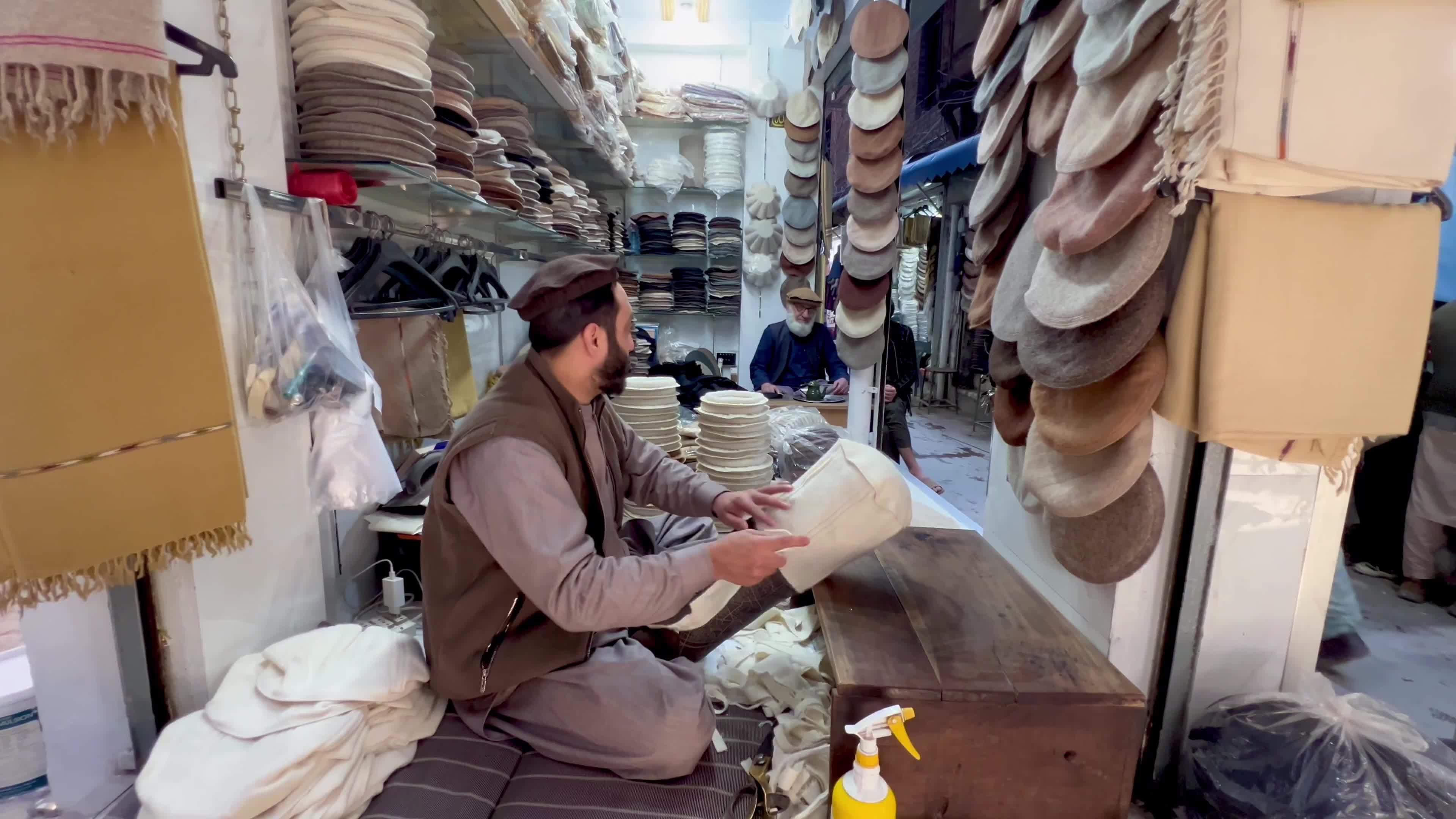 Pakistanis wear Chitrali caps amid cold winter weather