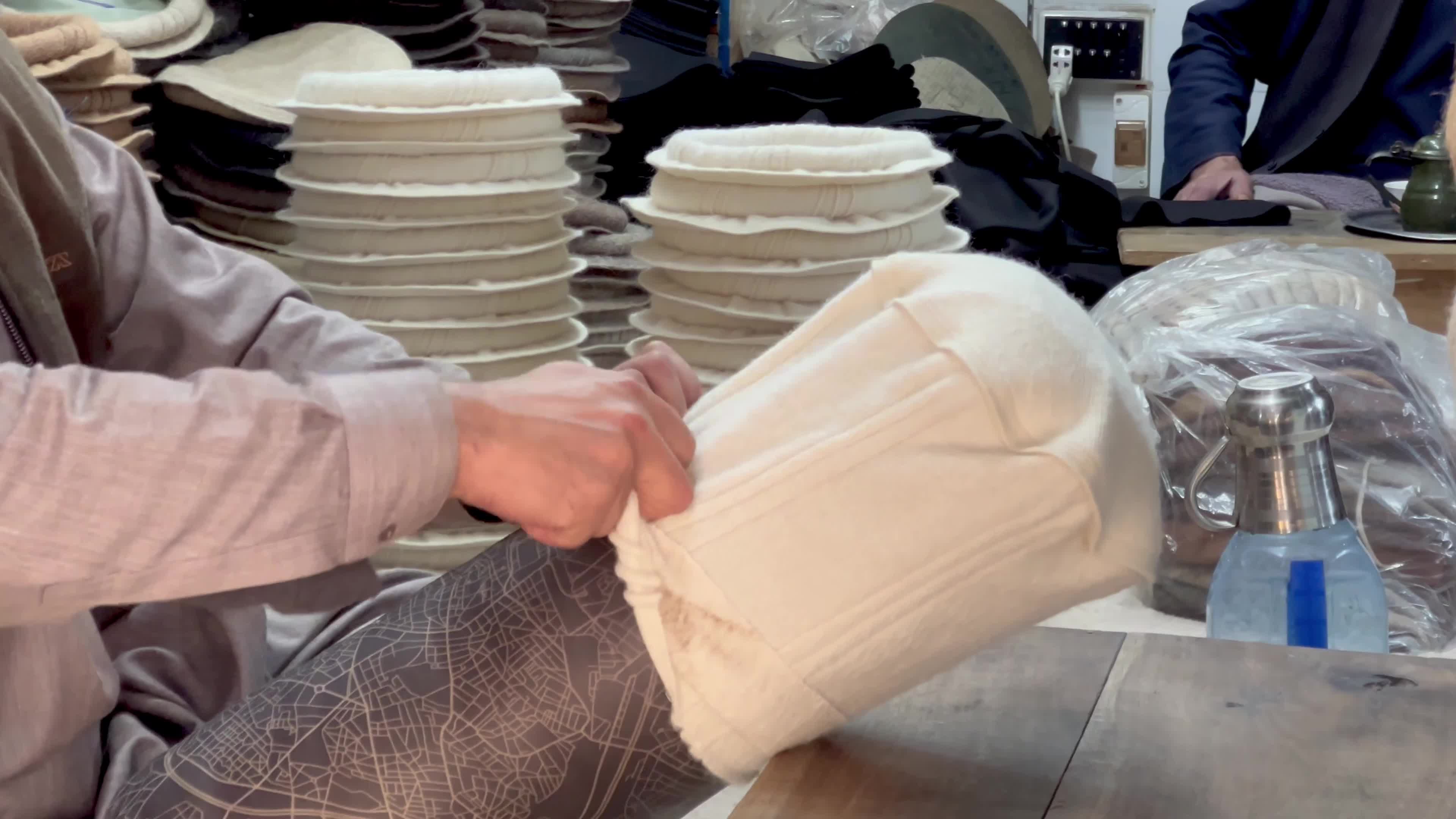 Pakistanis wear Chitrali caps amid cold winter weather