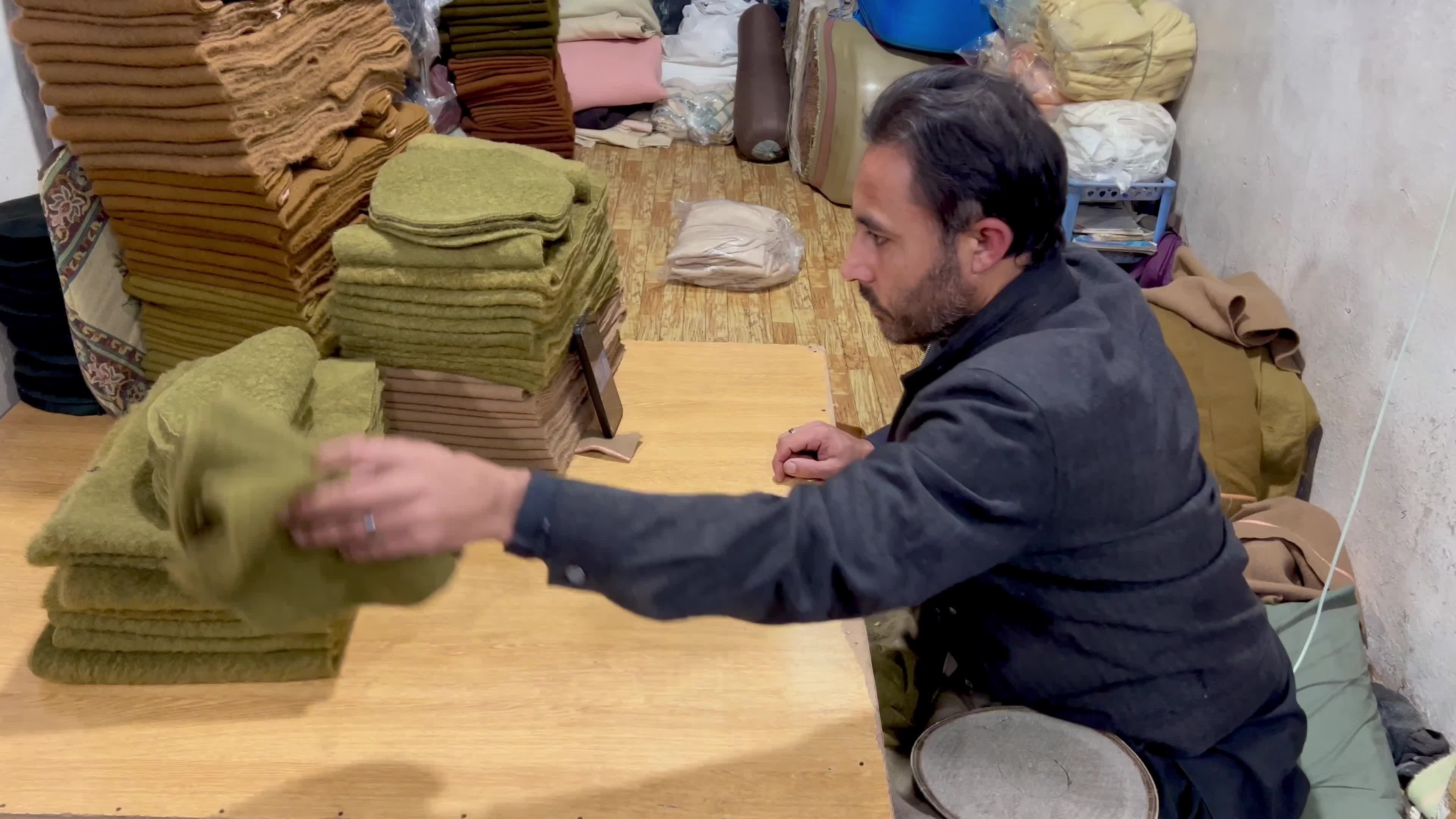 Pakistanis wear Chitrali caps amid cold winter weather