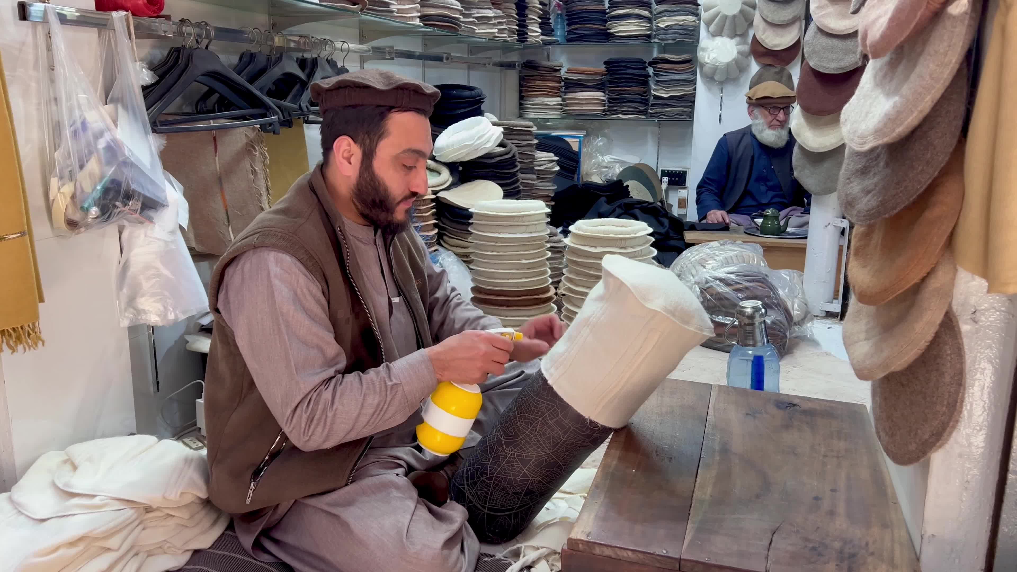 Pakistanis wear Chitrali caps amid cold winter weather
