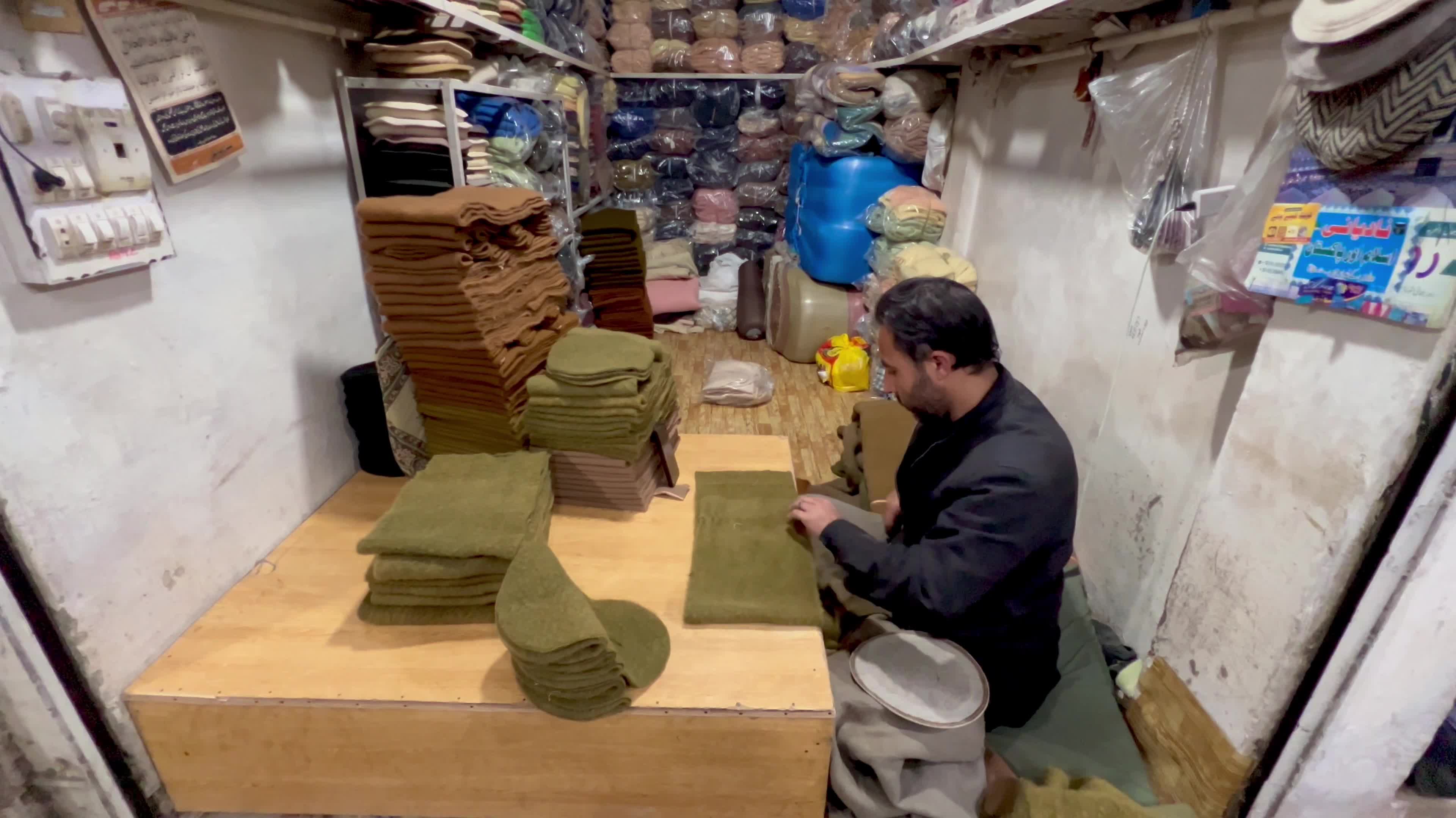 Pakistanis wear Chitrali caps amid cold winter weather