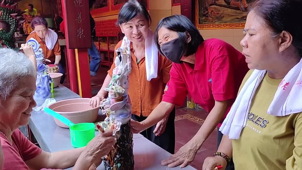 Bathing Ritual for God Statues Ahead of Chinese New Year in Indonesia