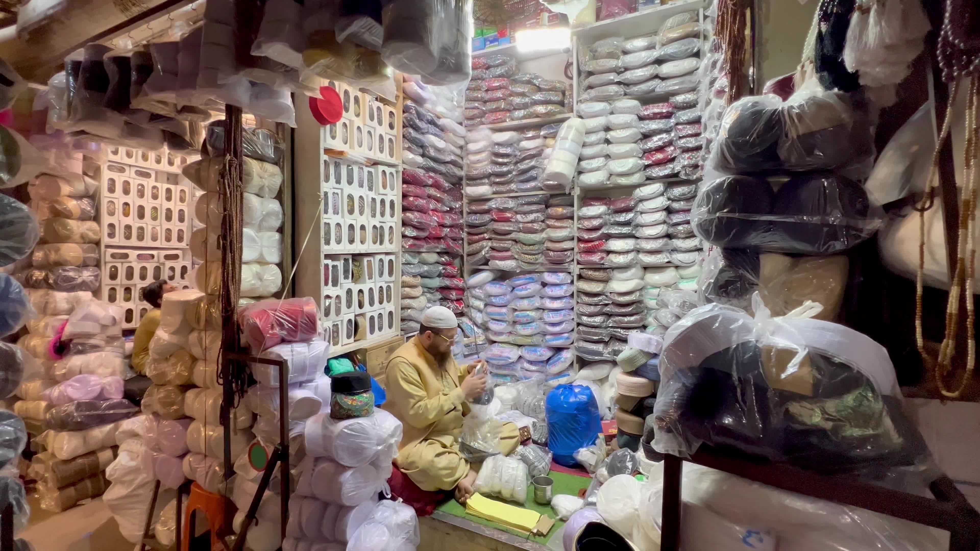Prayer caps and beads on sale ahead of Ramadan in Peshawar