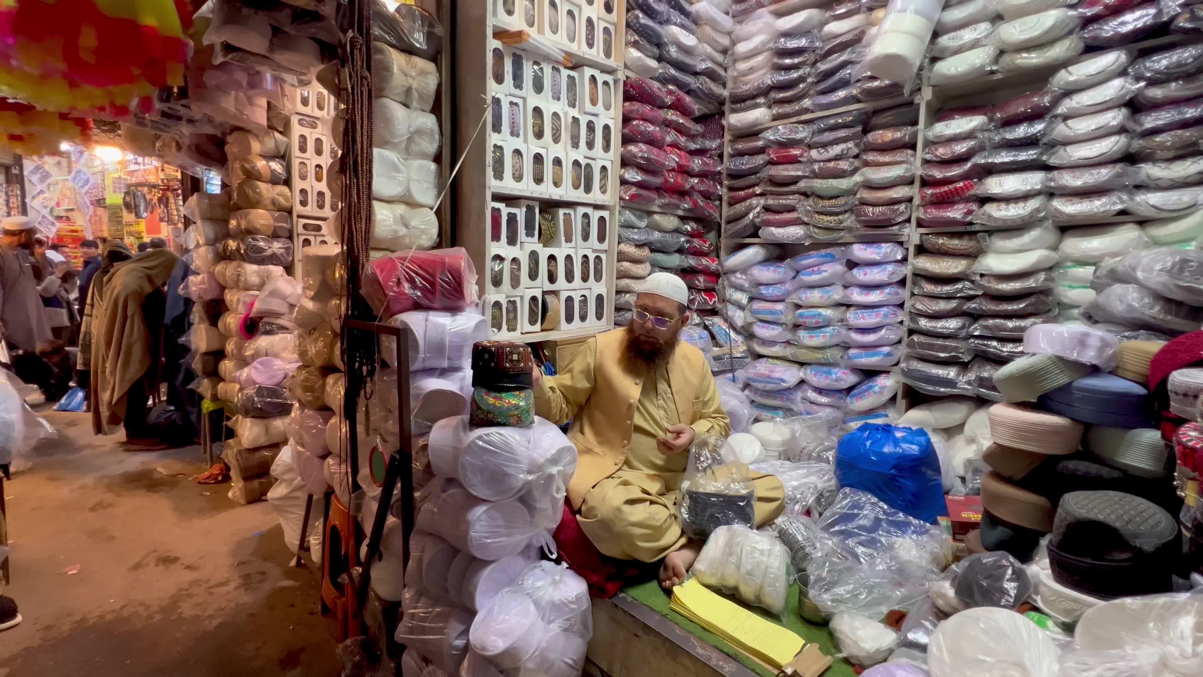 Prayer caps and beads on sale ahead of Ramadan in Peshawar
