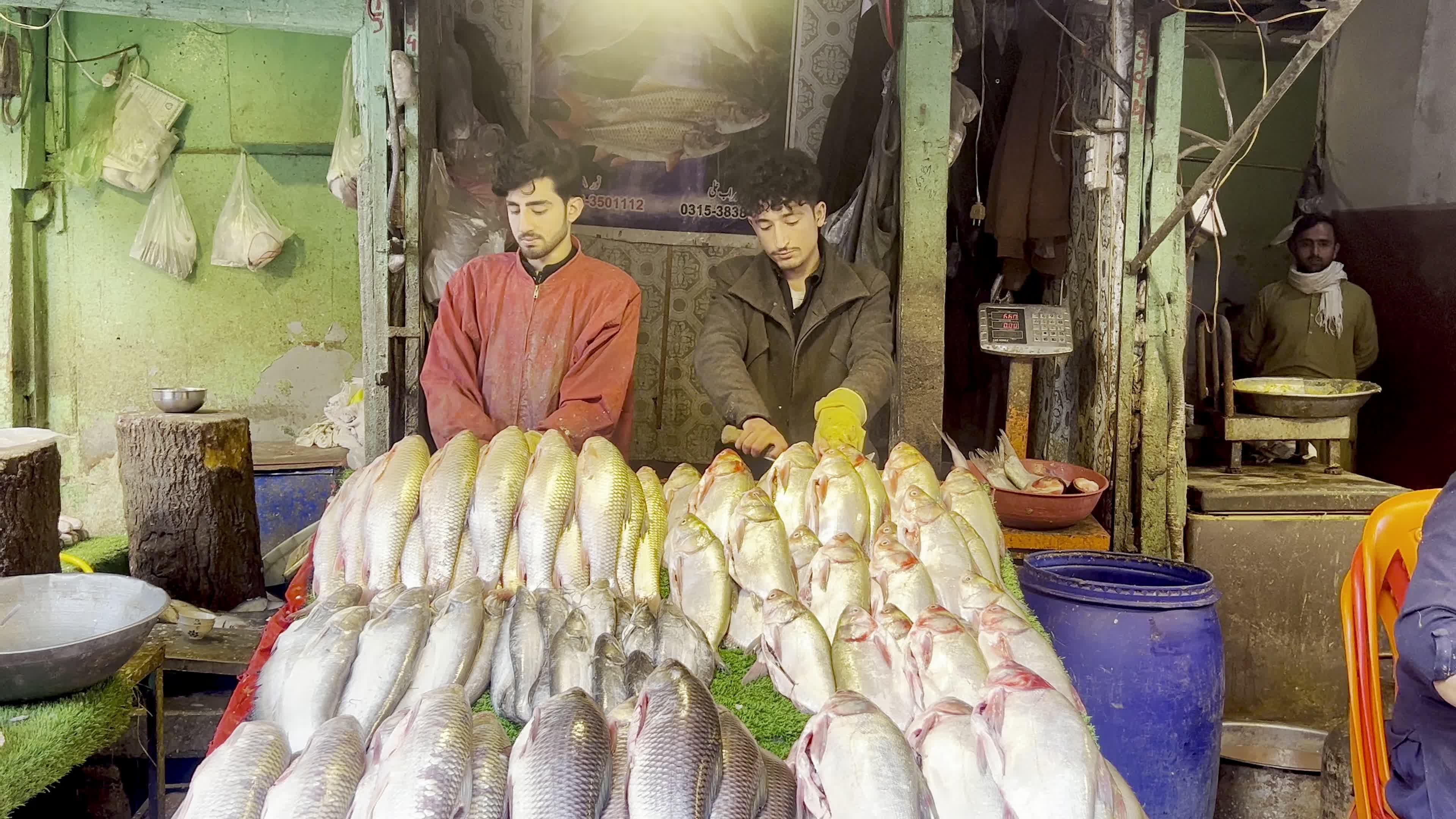 People shop for goods ahead of Ramadan in Peshawar