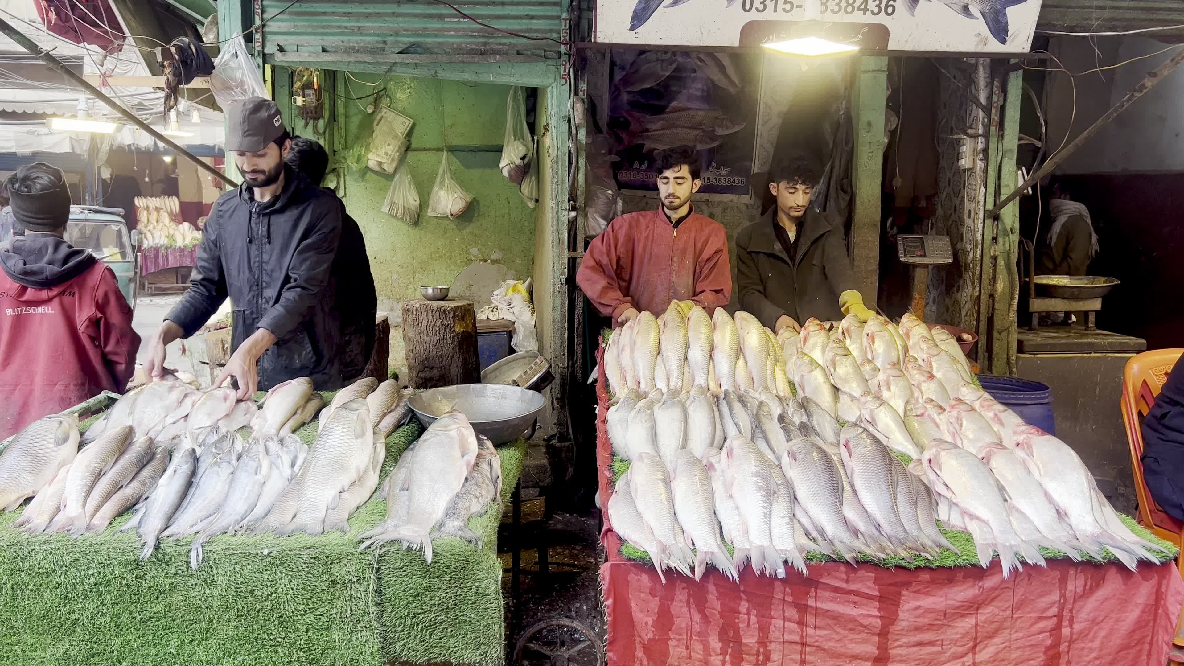 People shop for goods ahead of Ramadan in Peshawar