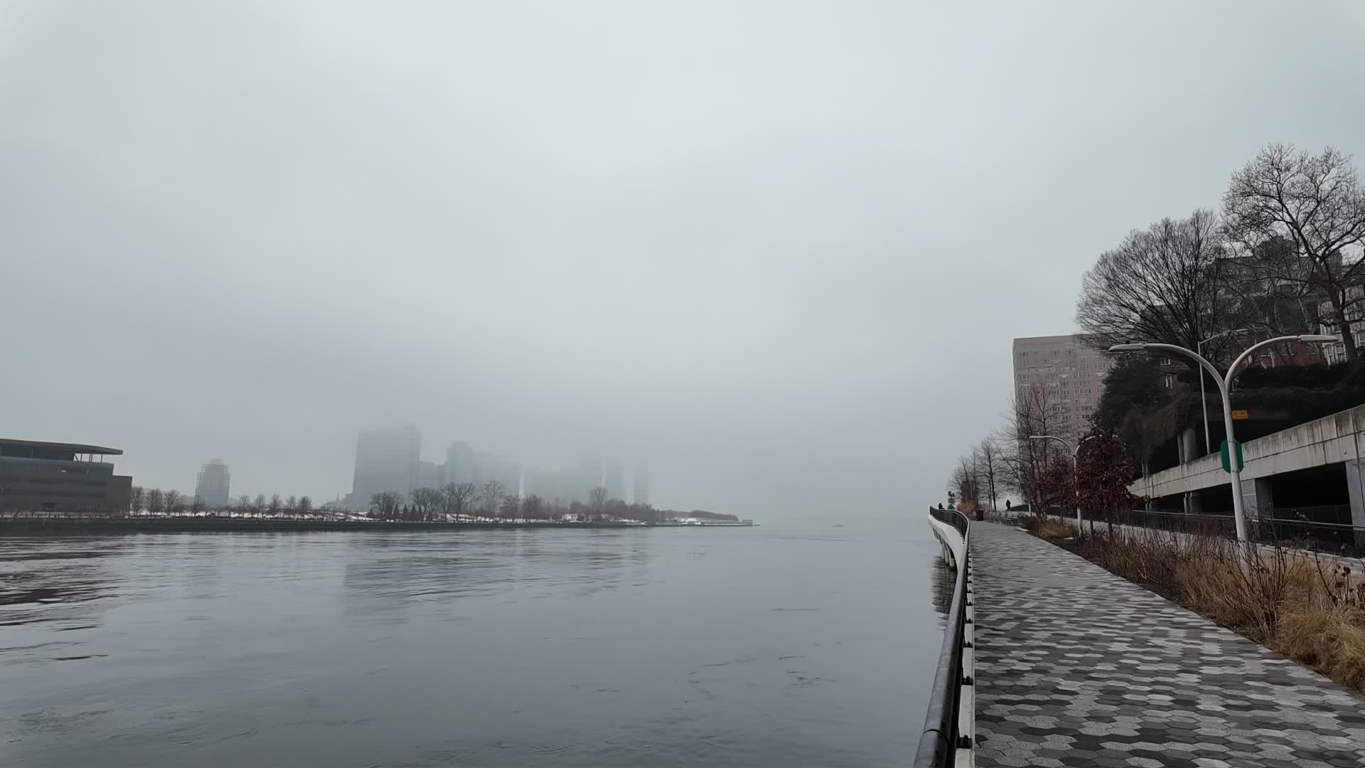 Fog covers the East River