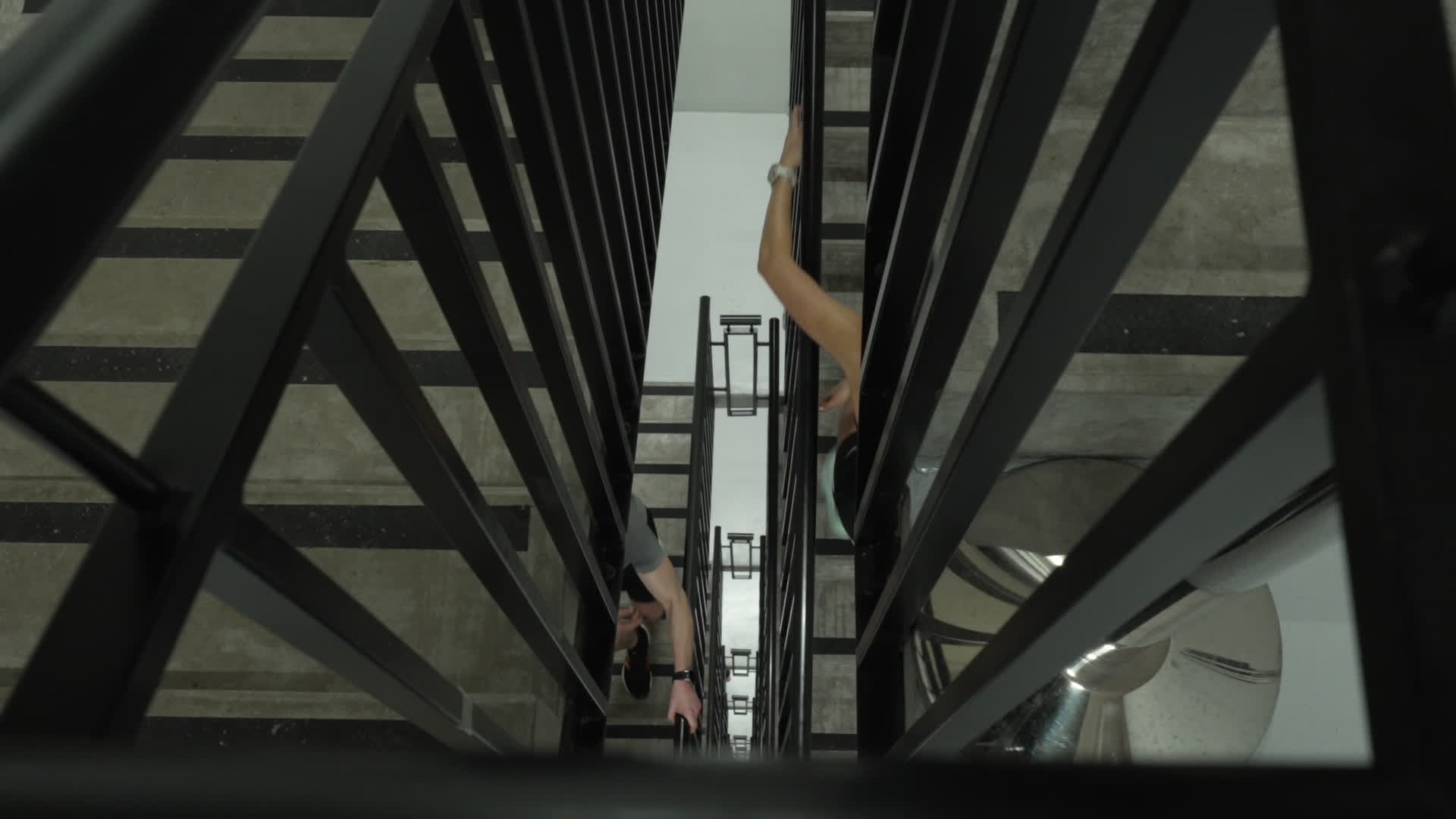 People take part in "Everest" skyscraper run