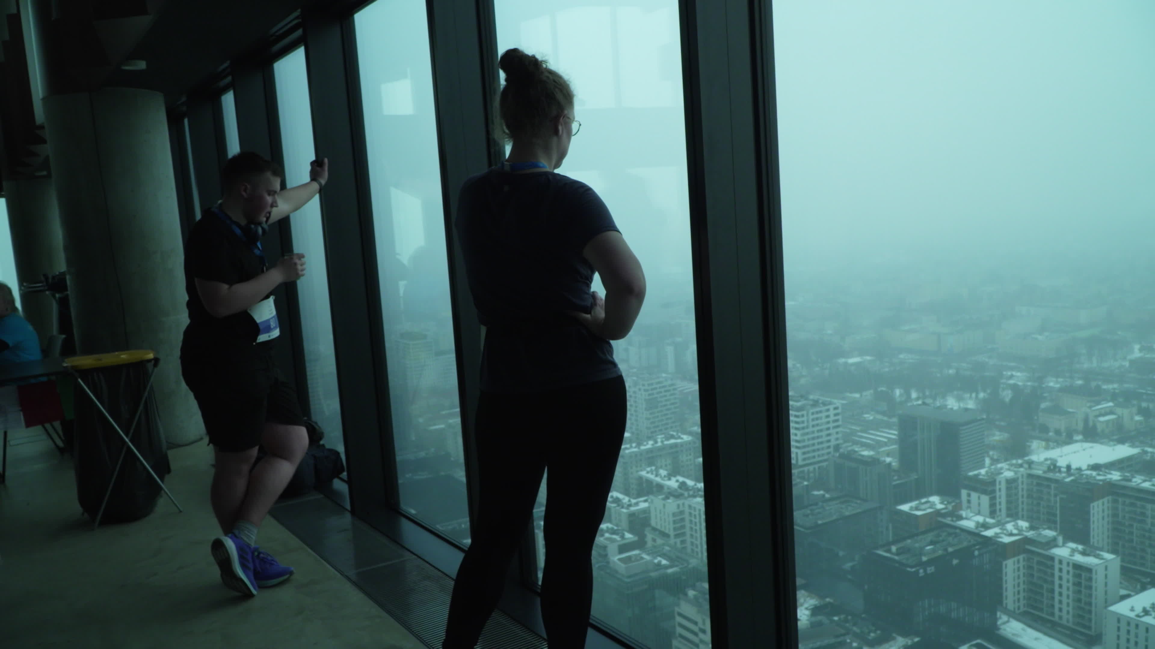 People take part in "Everest" skyscraper run
