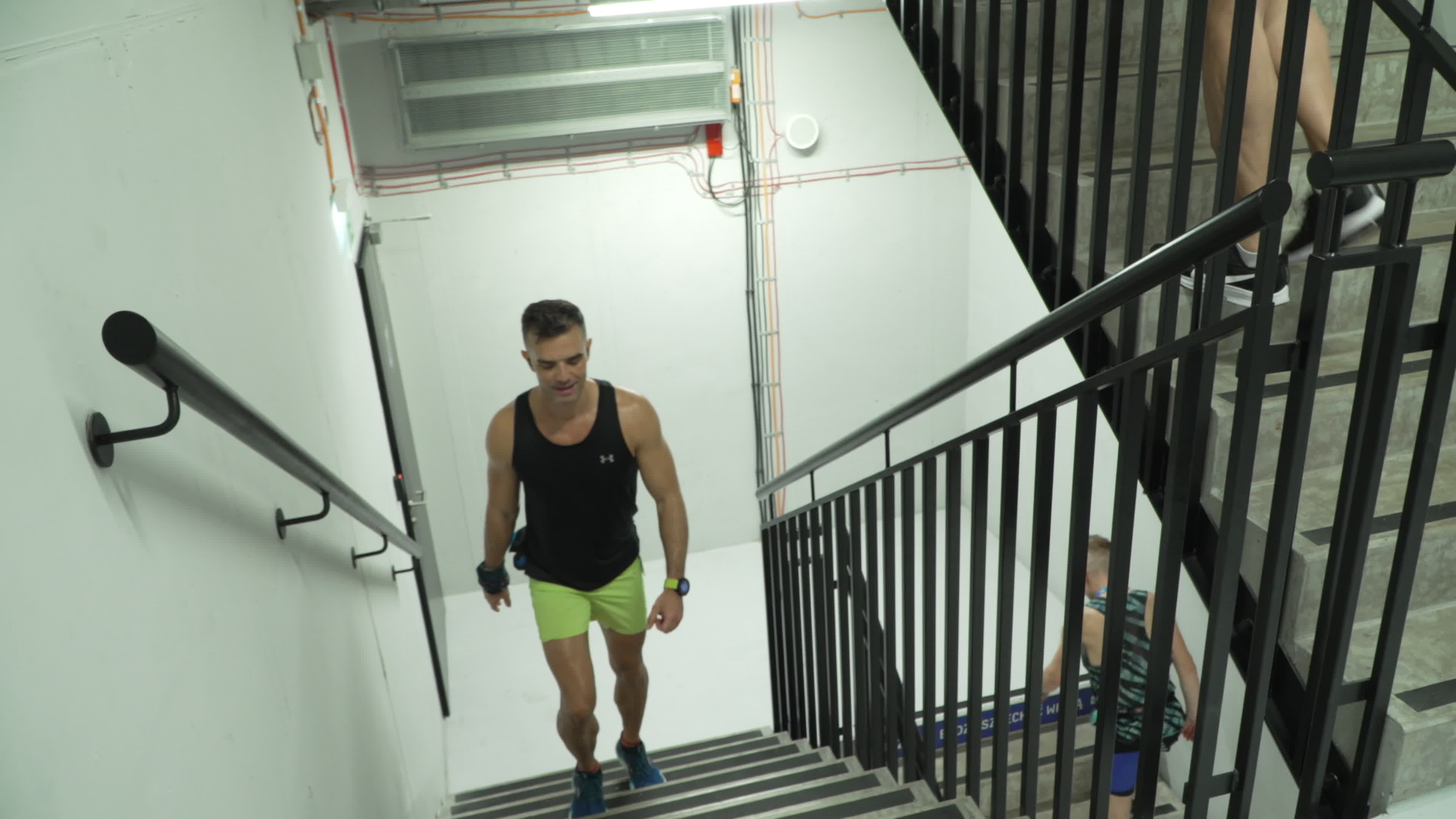 People take part in "Everest" skyscraper run