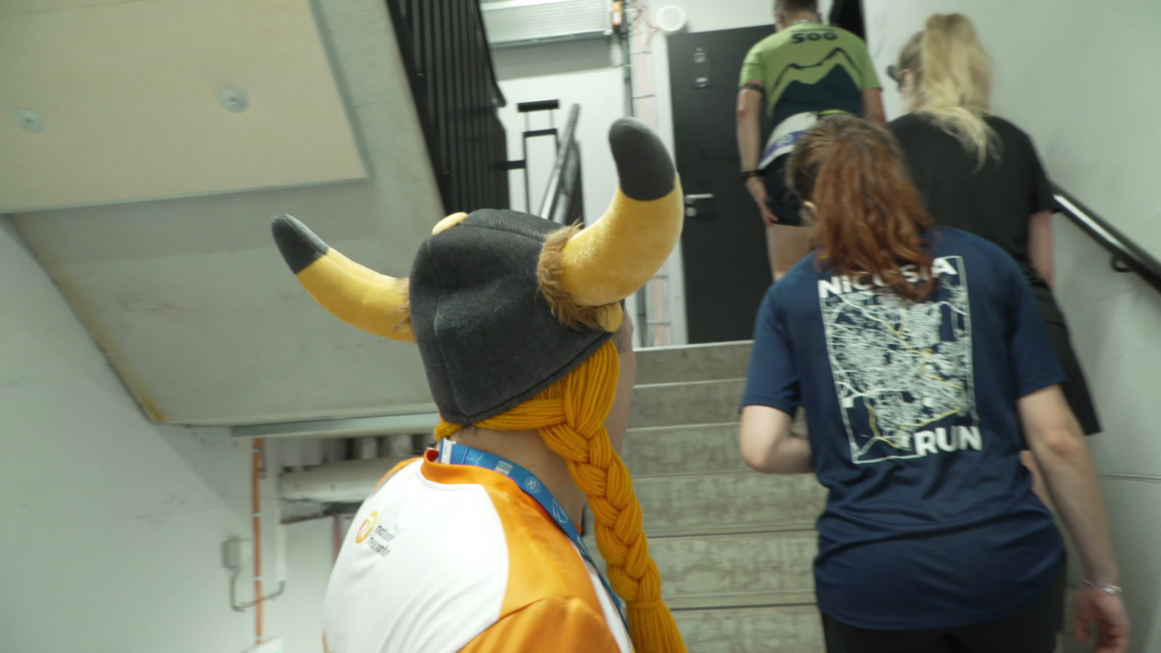 People take part in "Everest" skyscraper run
