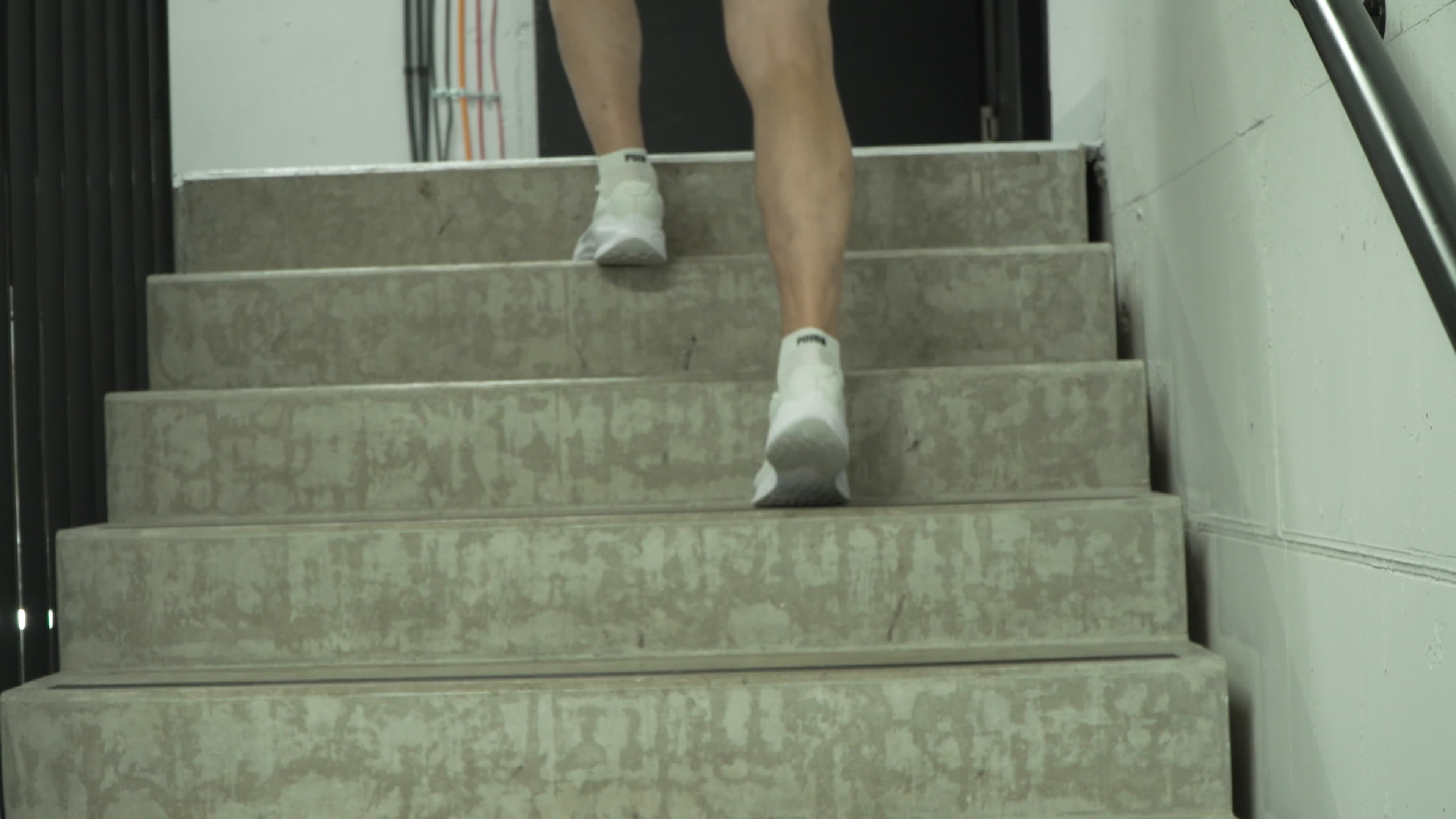 People take part in "Everest" skyscraper run