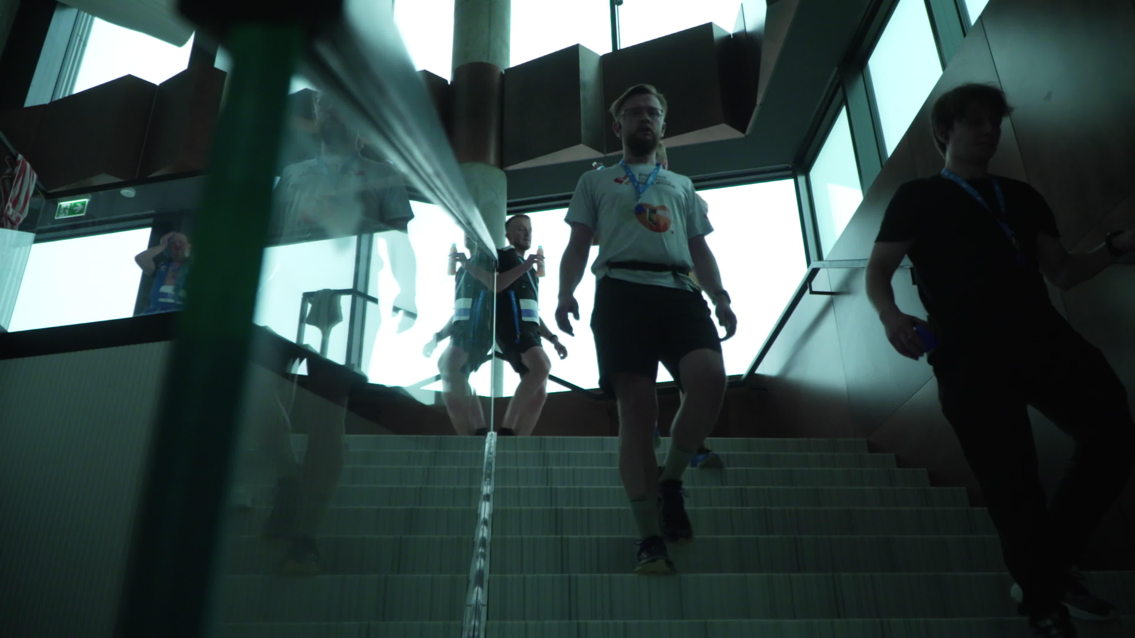 People take part in "Everest" skyscraper run