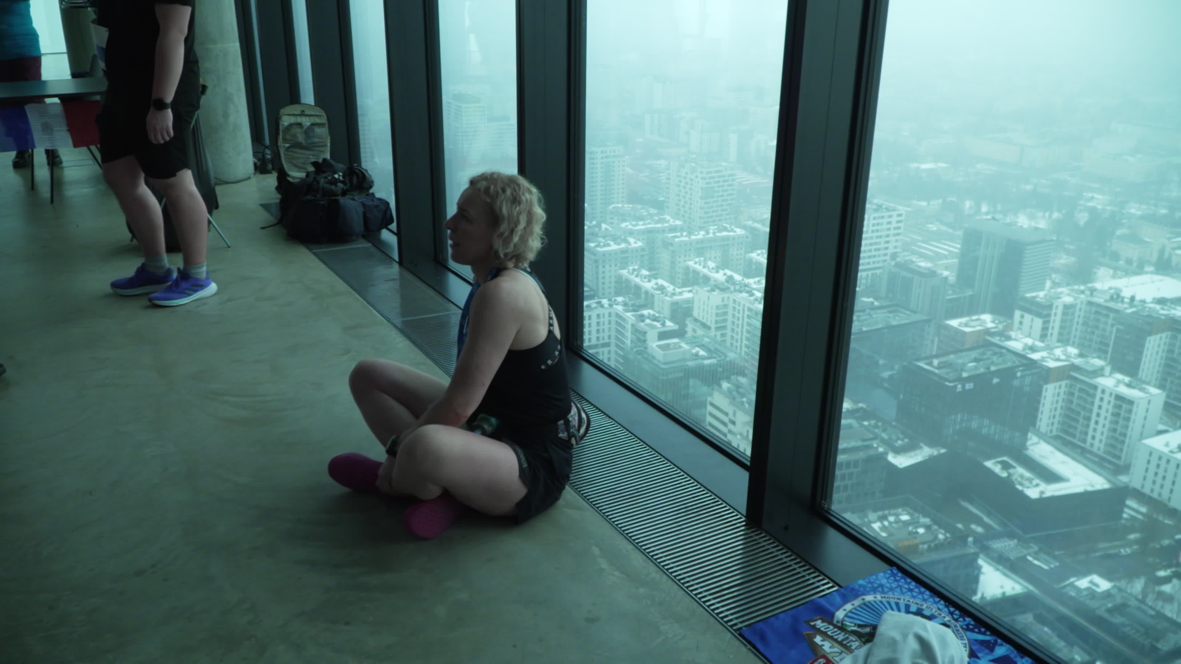 People take part in "Everest" skyscraper run