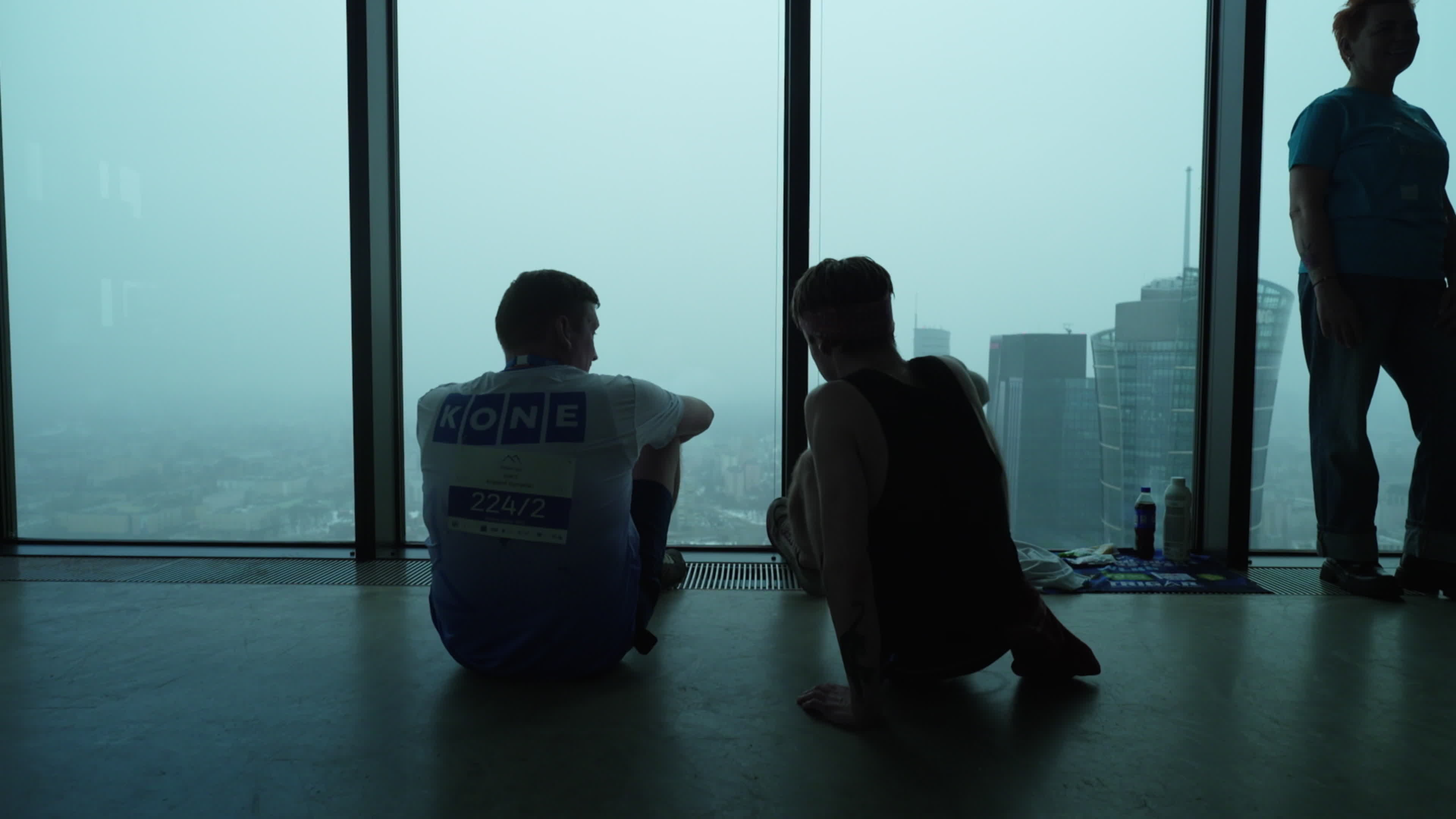 People take part in "Everest" skyscraper run