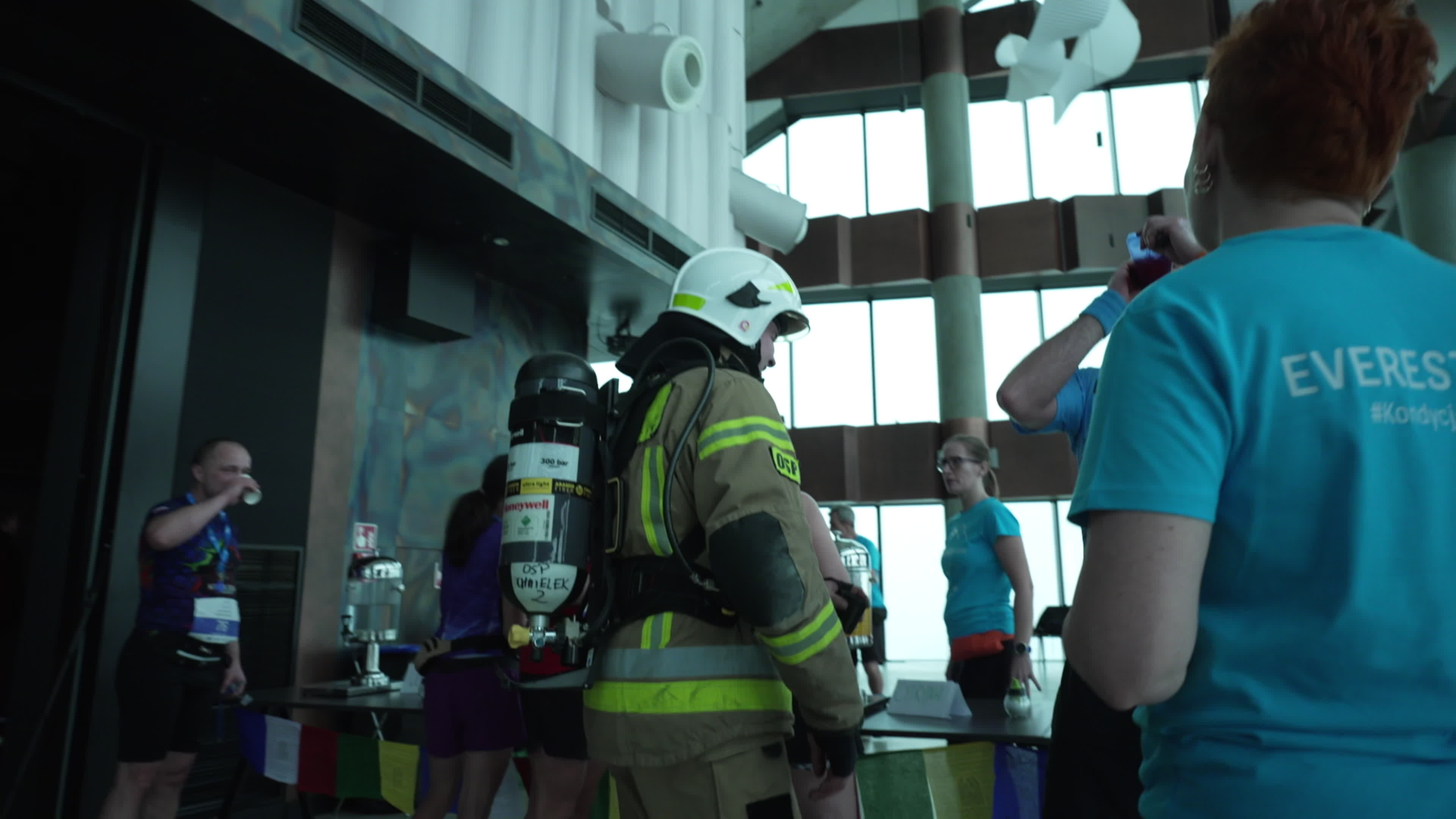 People take part in "Everest" skyscraper run