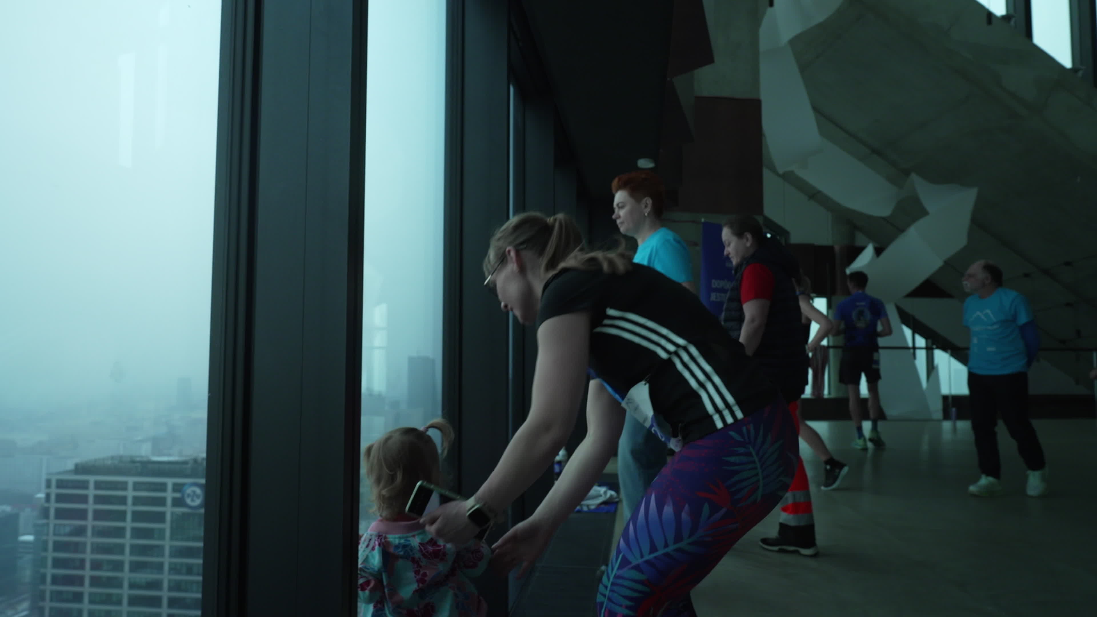 People take part in "Everest" skyscraper run