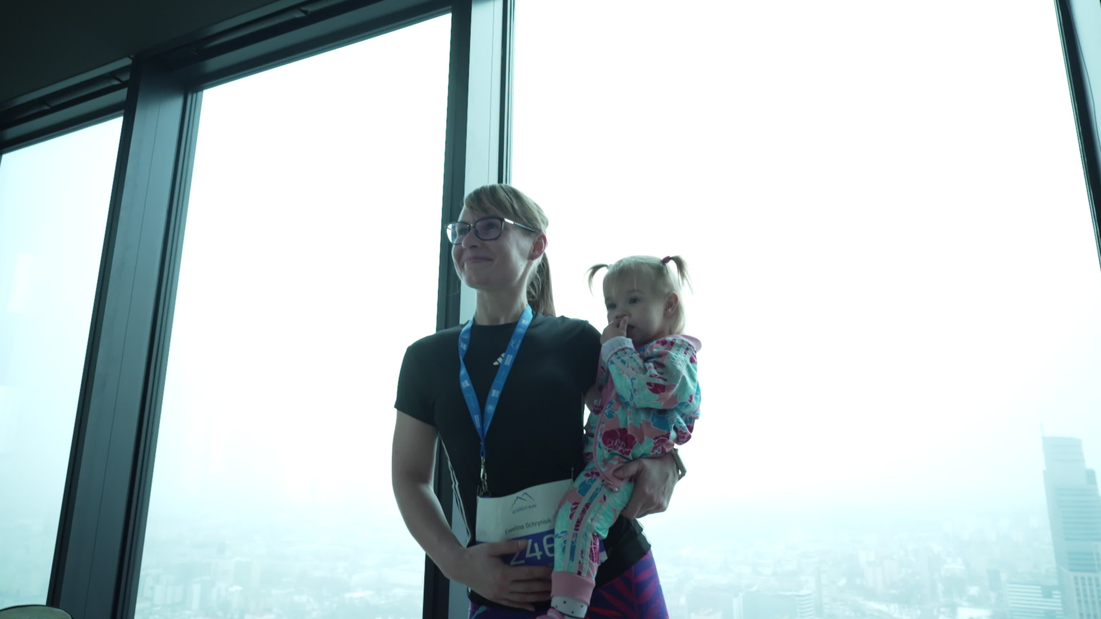 People take part in "Everest" skyscraper run