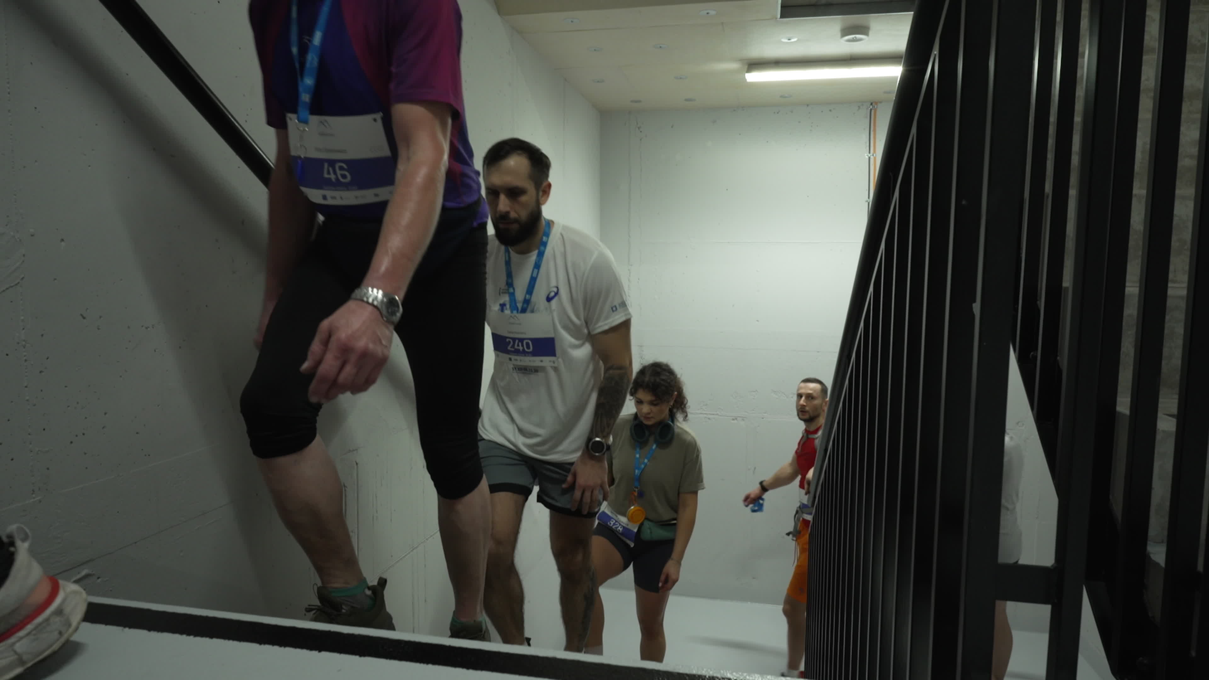 People take part in "Everest" skyscraper run