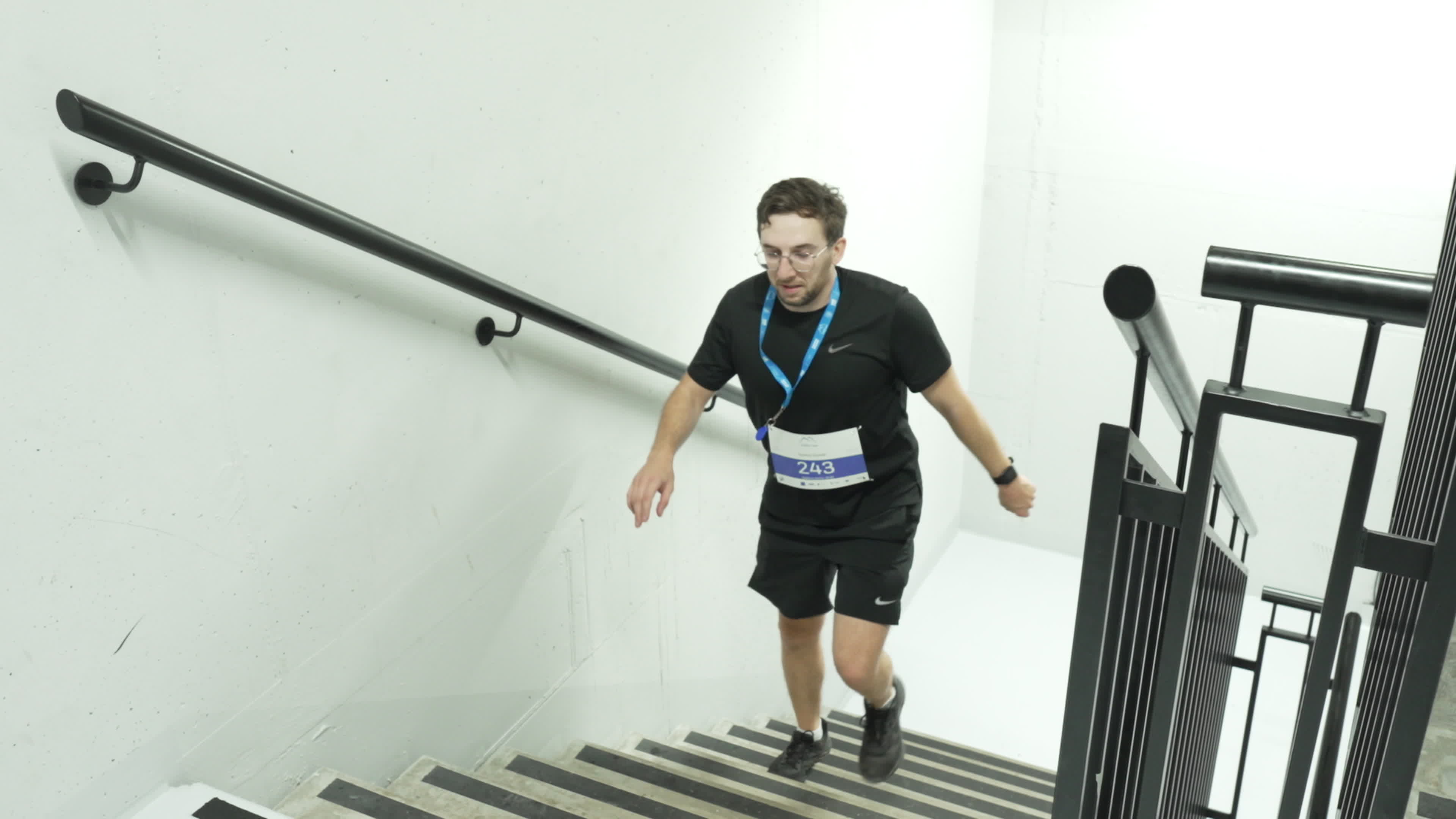 People take part in "Everest" skyscraper run