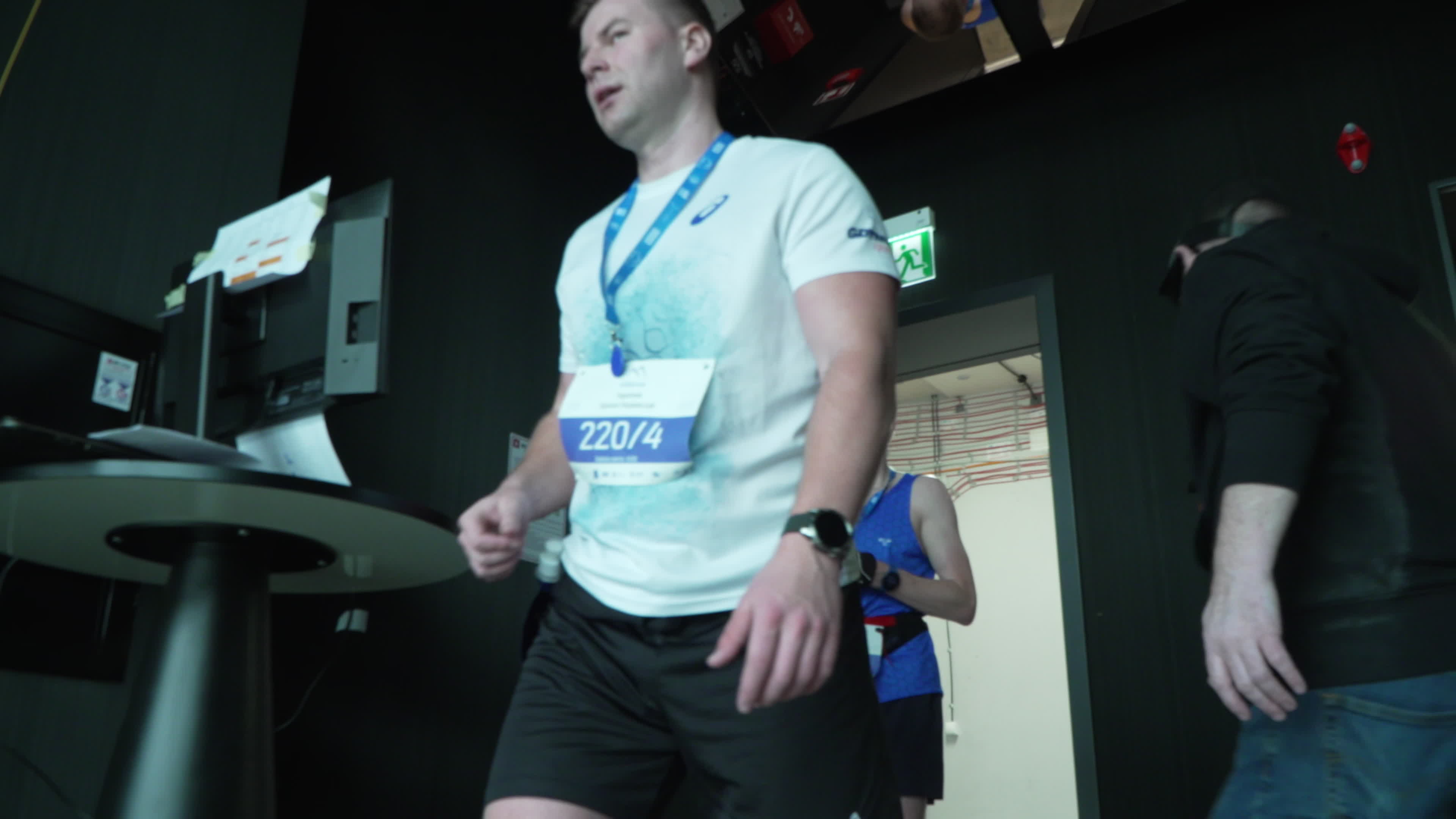 People take part in "Everest" skyscraper run