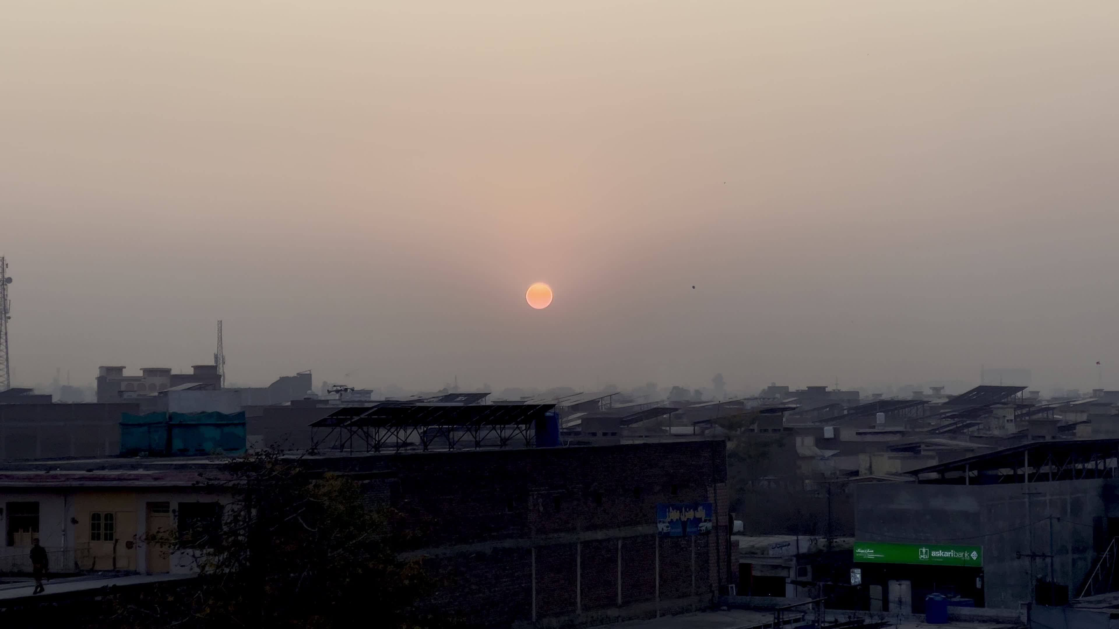 Sunset Over Peshawar Paints the Sky in Golden Hues