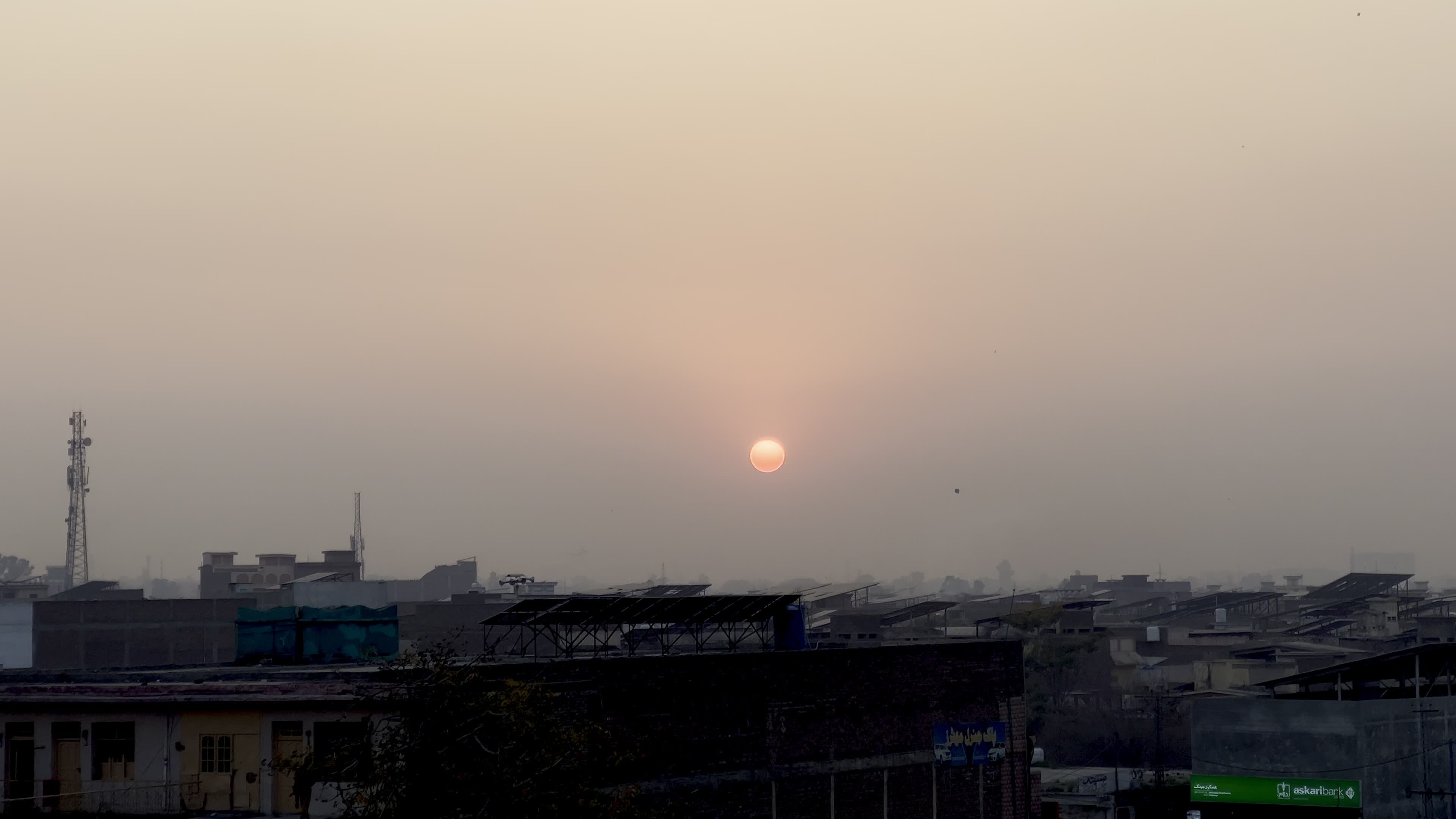 Sunset Over Peshawar Paints the Sky in Golden Hues