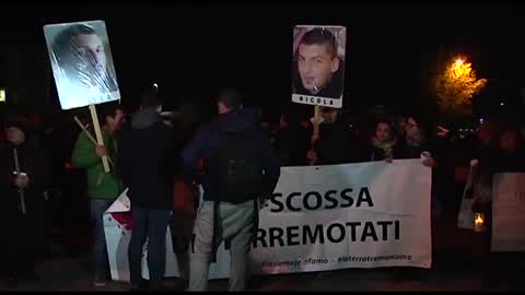Torchlight procession for earthquake victims in L'Aquila