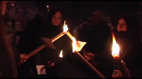 Torchlight procession for earthquake victims in L'Aquila