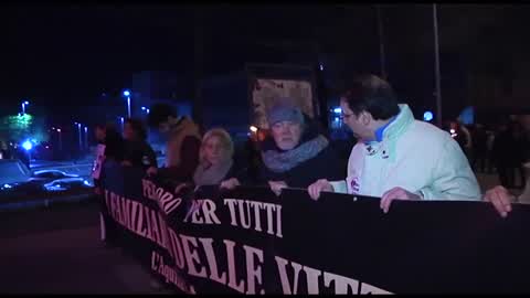 Torchlight procession for earthquake victims in L'Aquila
