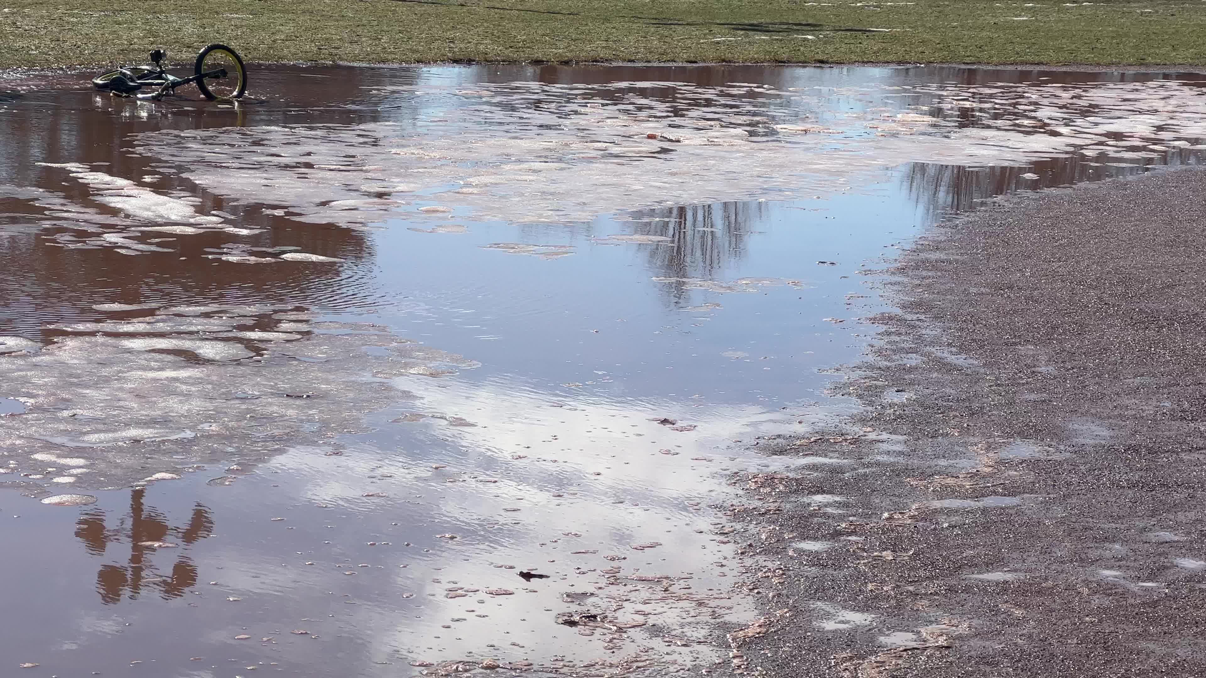 Snow begins to melt during warm weather in Toronto