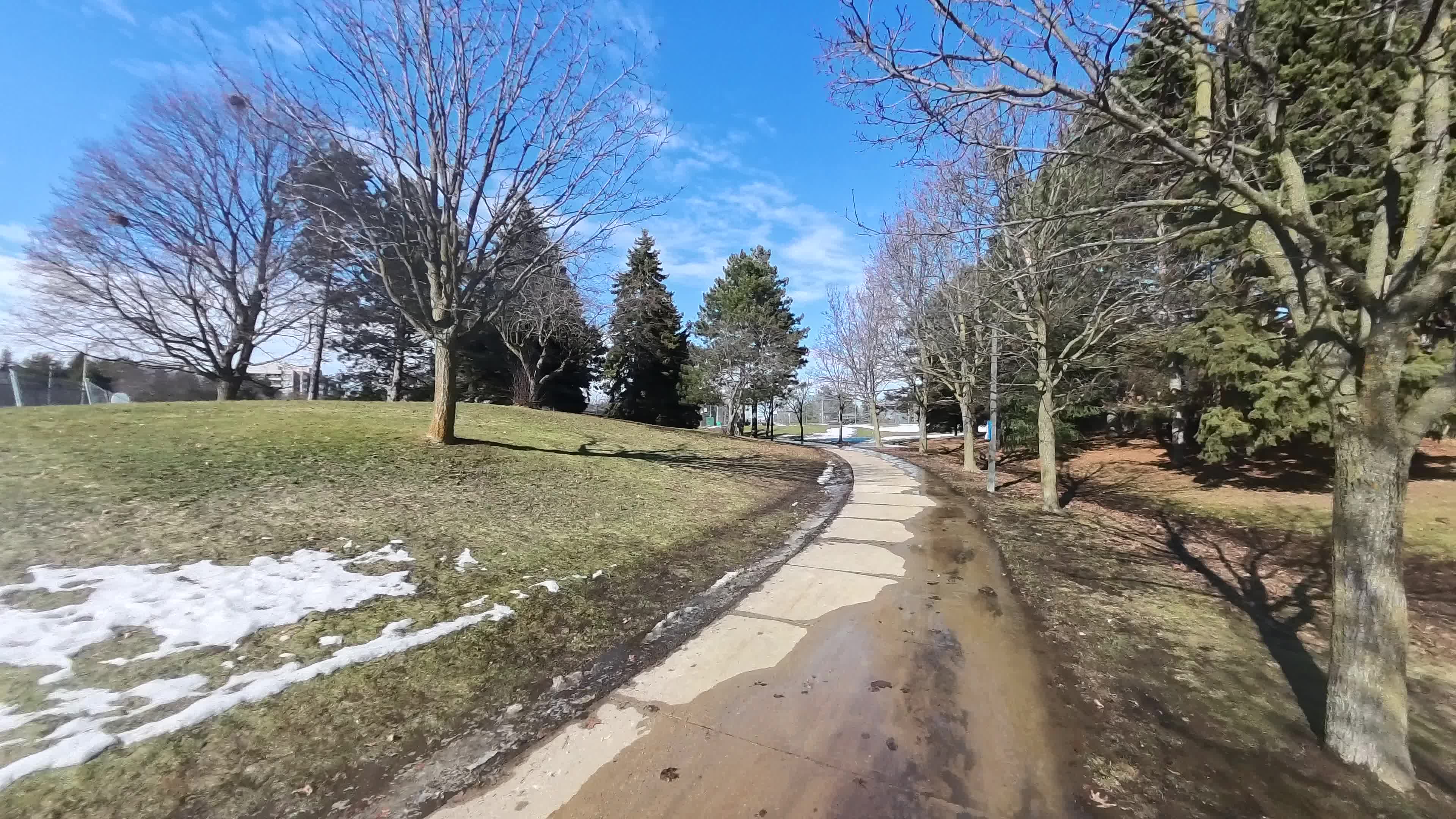 Snow begins to melt during warm weather in Toronto