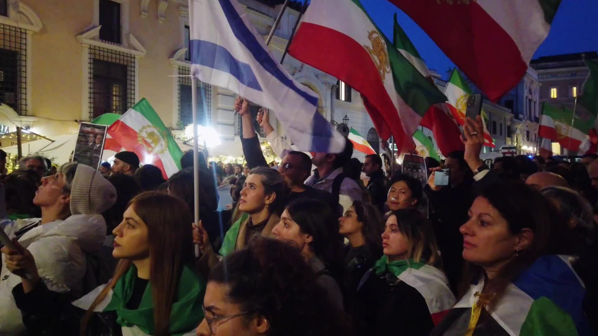 Members of the anti-regime Iranian community in Rome gather in Piazza Santi Apostoli