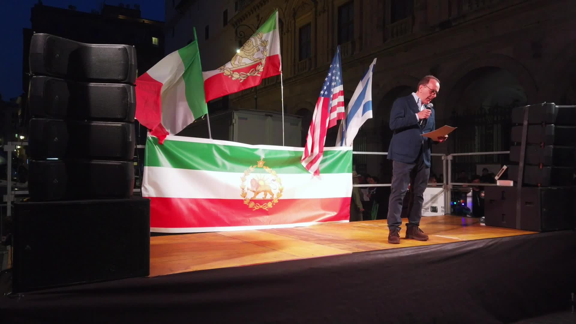 Members of the anti-regime Iranian community in Rome gather in Piazza Santi Apostoli