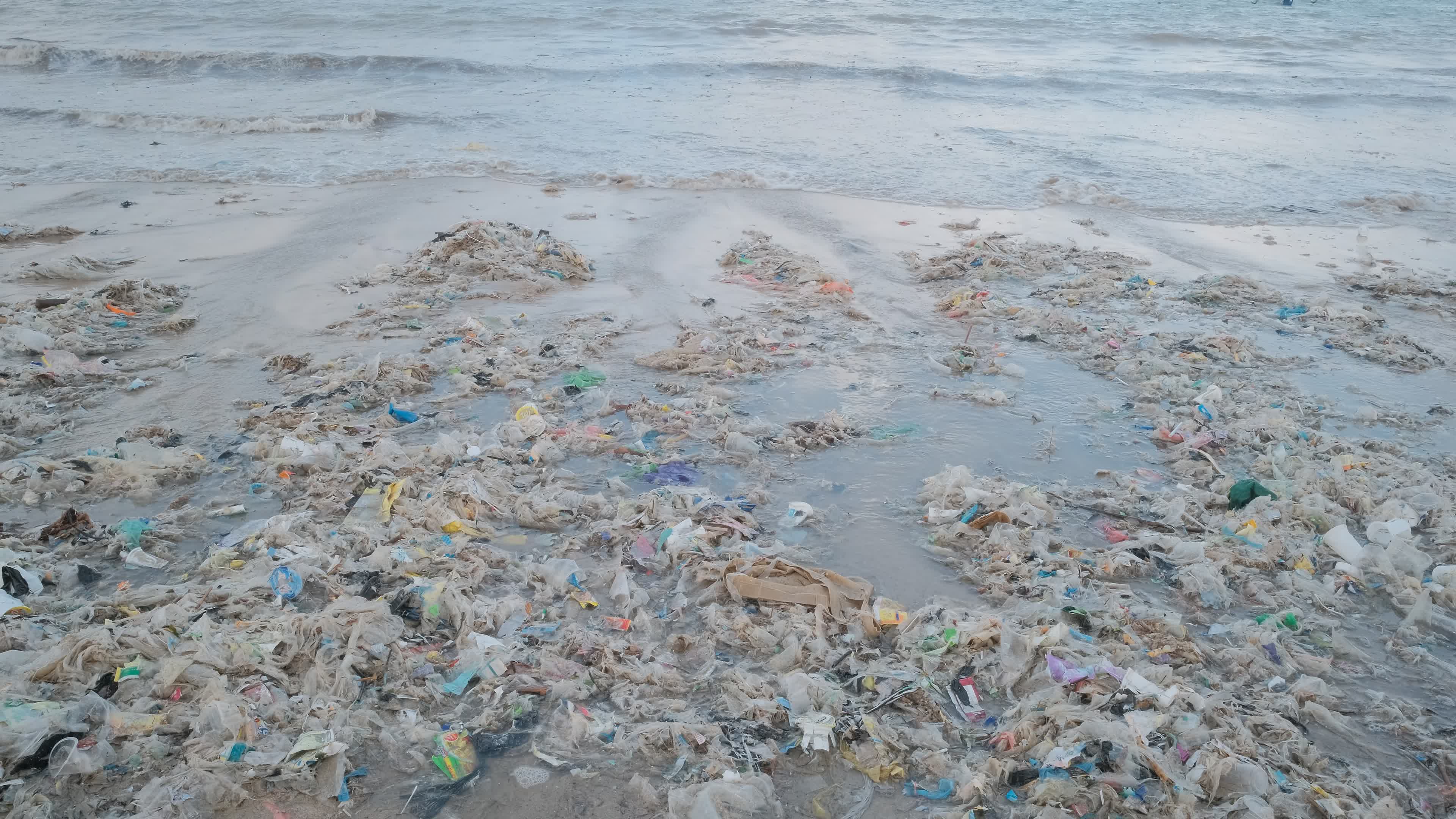 Seasonal plastic waste on the beach, Bali island, Indonesia.