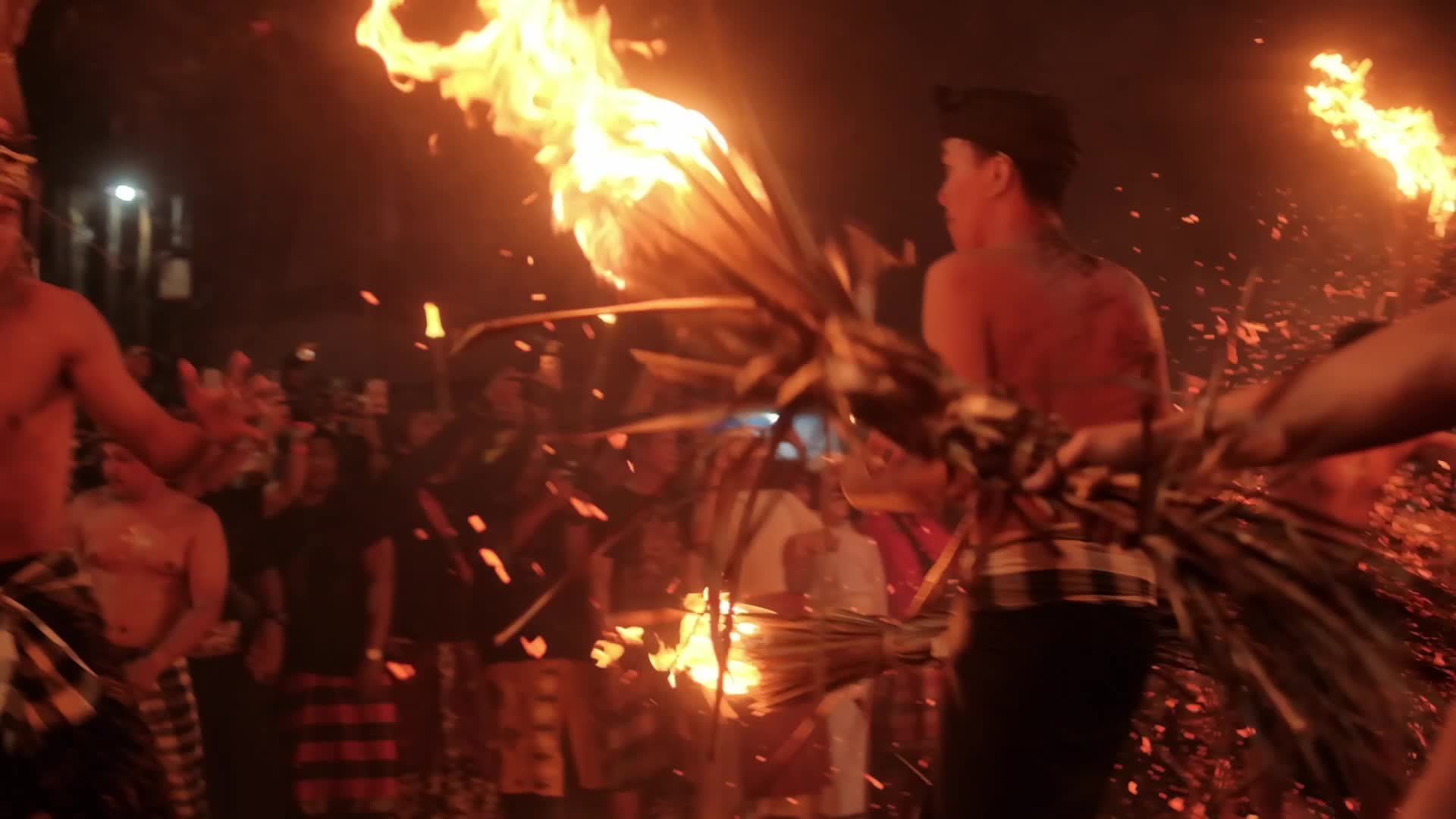 The Lukat Geni tradition of fire war before Nyepi Day on the island of Bali, Indonesia.