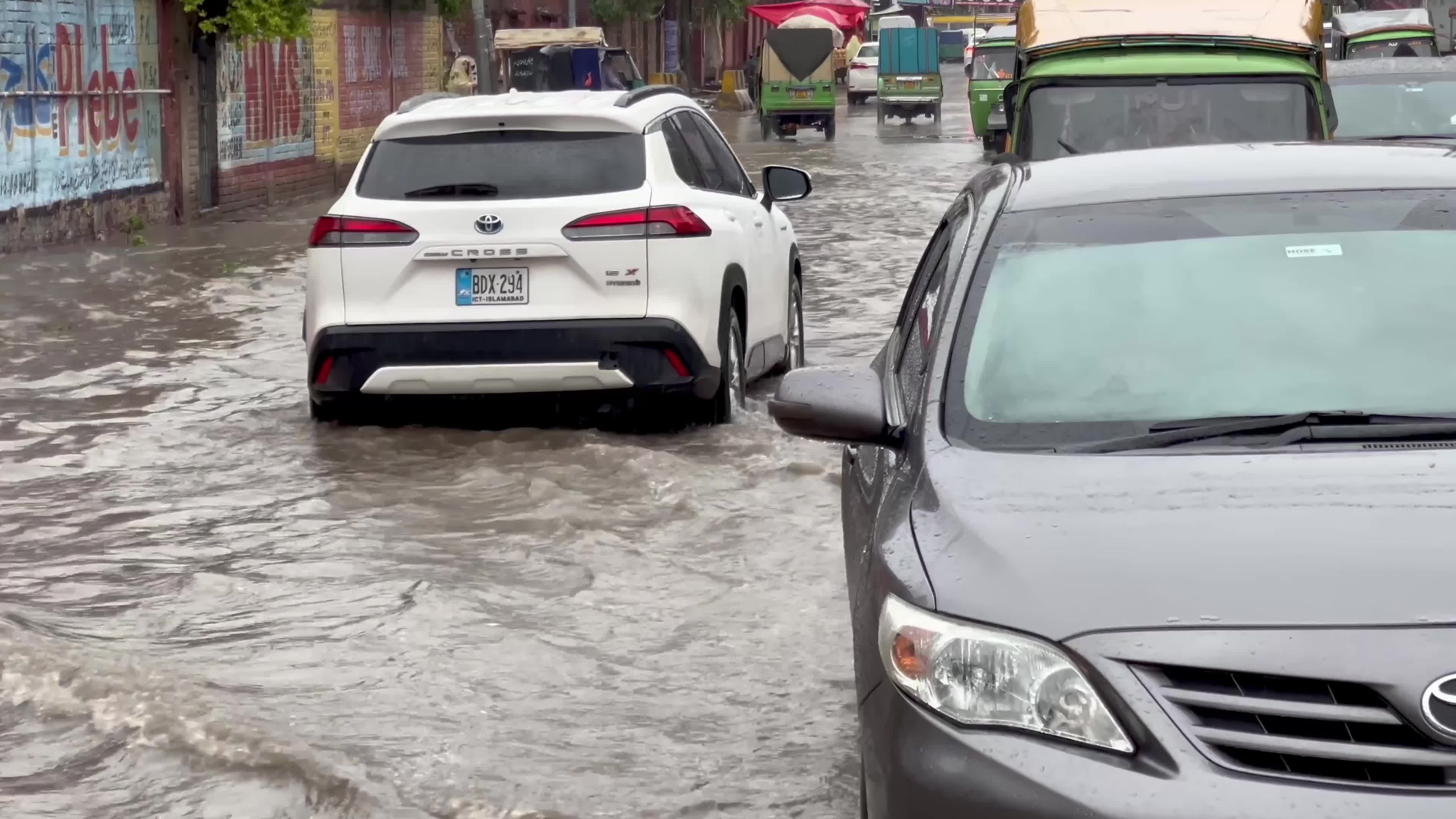 Flooded Streets in Peshawar After Heavy Rains Leave Dozens Dead