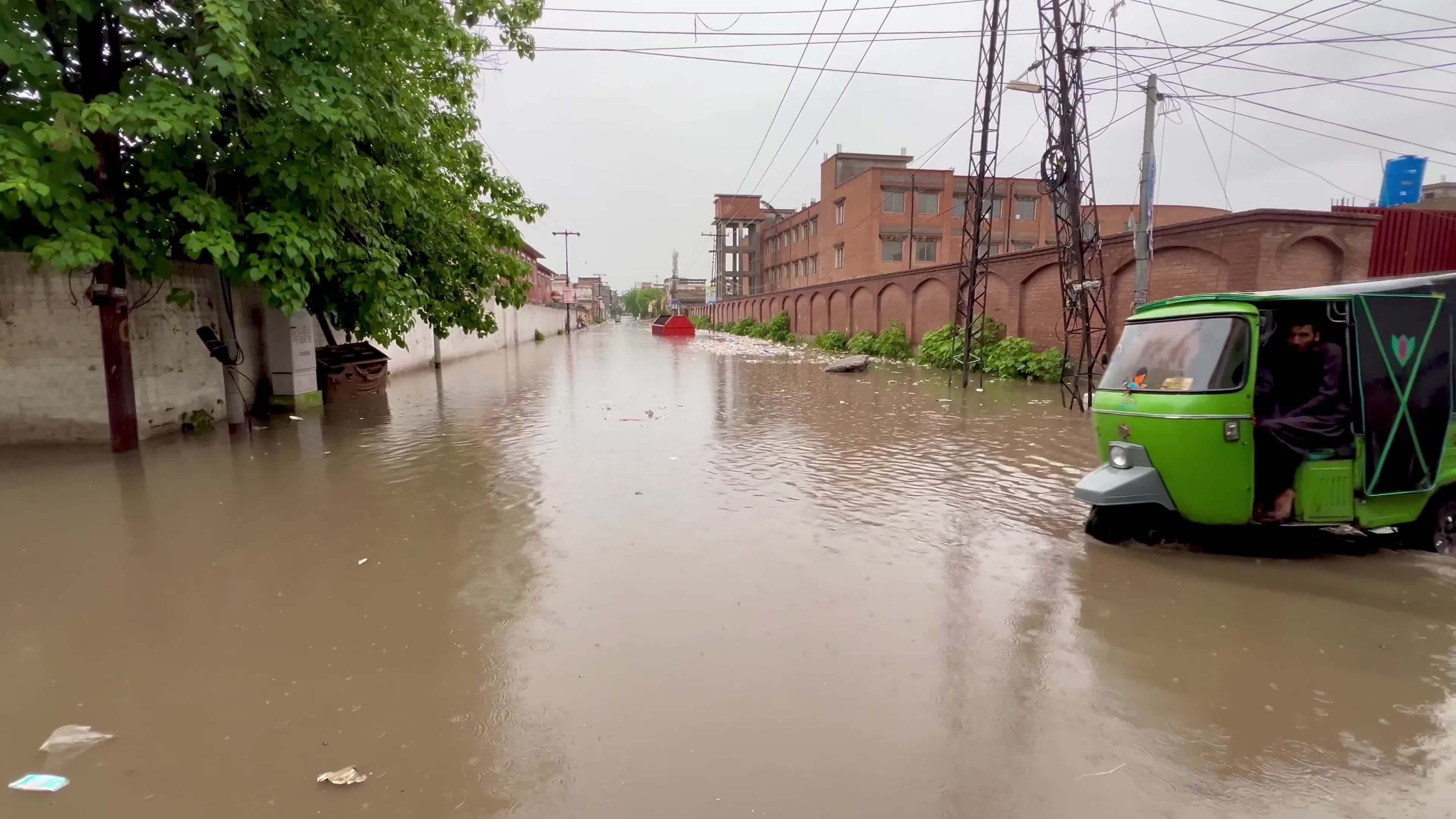Flooded Streets in Peshawar After Heavy Rains Leave Dozens Dead